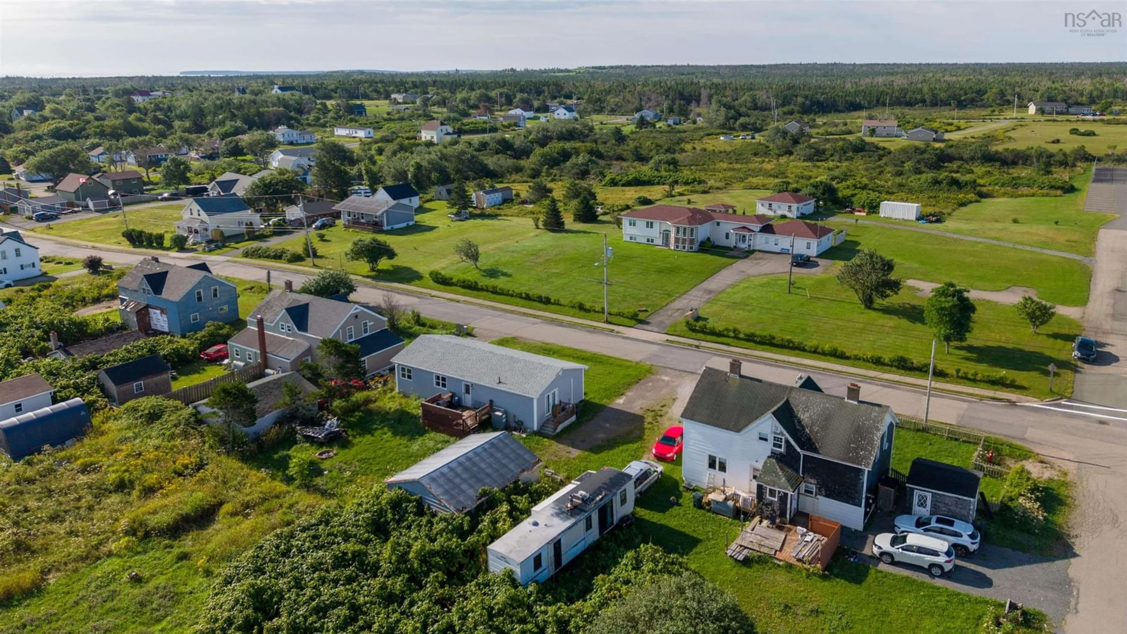 A pic from outside/outdoor area/front of a property/back of a property/a pic from drone, street for Centre Ave #60, Donkin Nova Scotia B1A 6N3