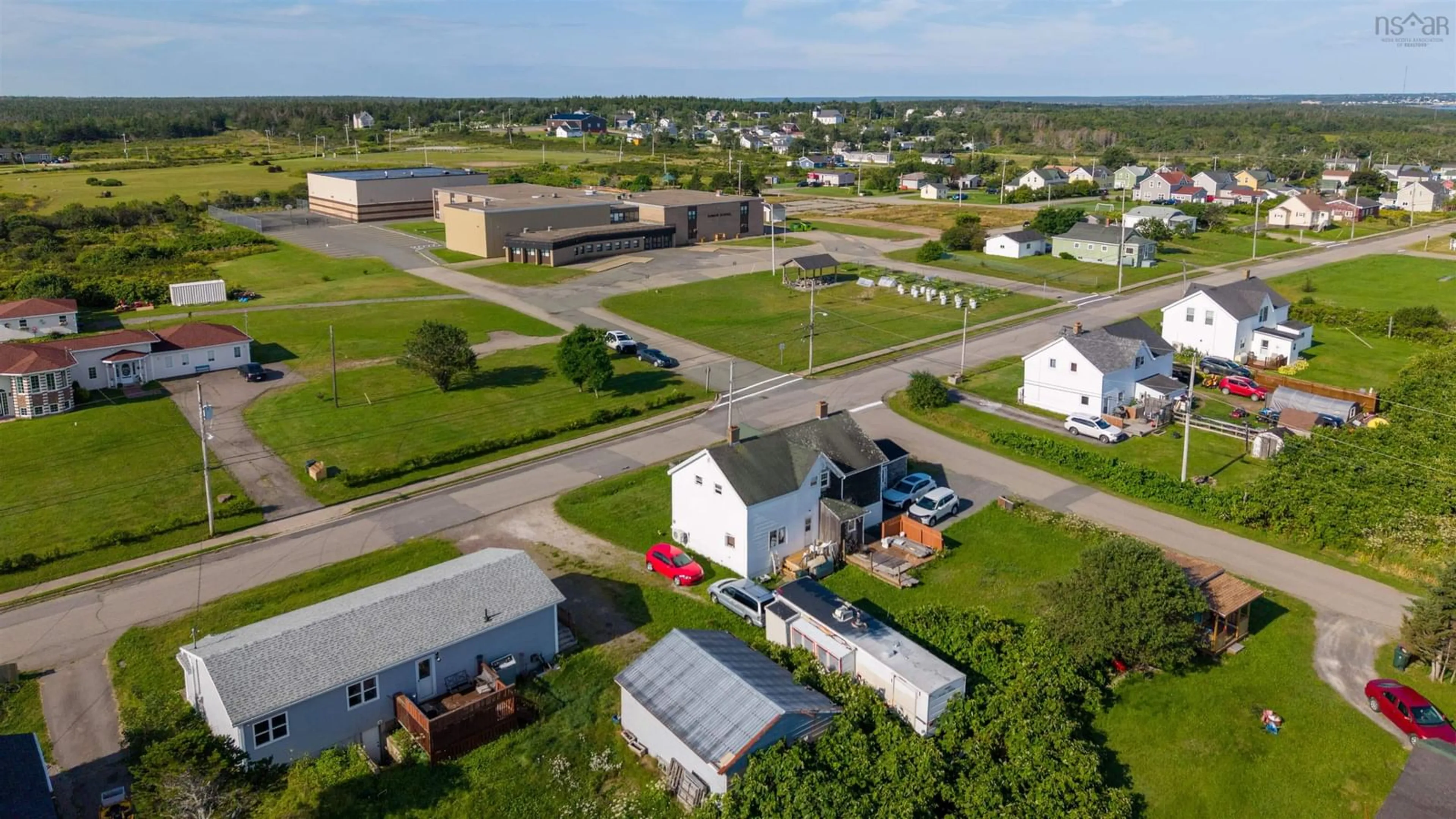 A pic from outside/outdoor area/front of a property/back of a property/a pic from drone, street for Centre Ave #60, Donkin Nova Scotia B1A 6N3