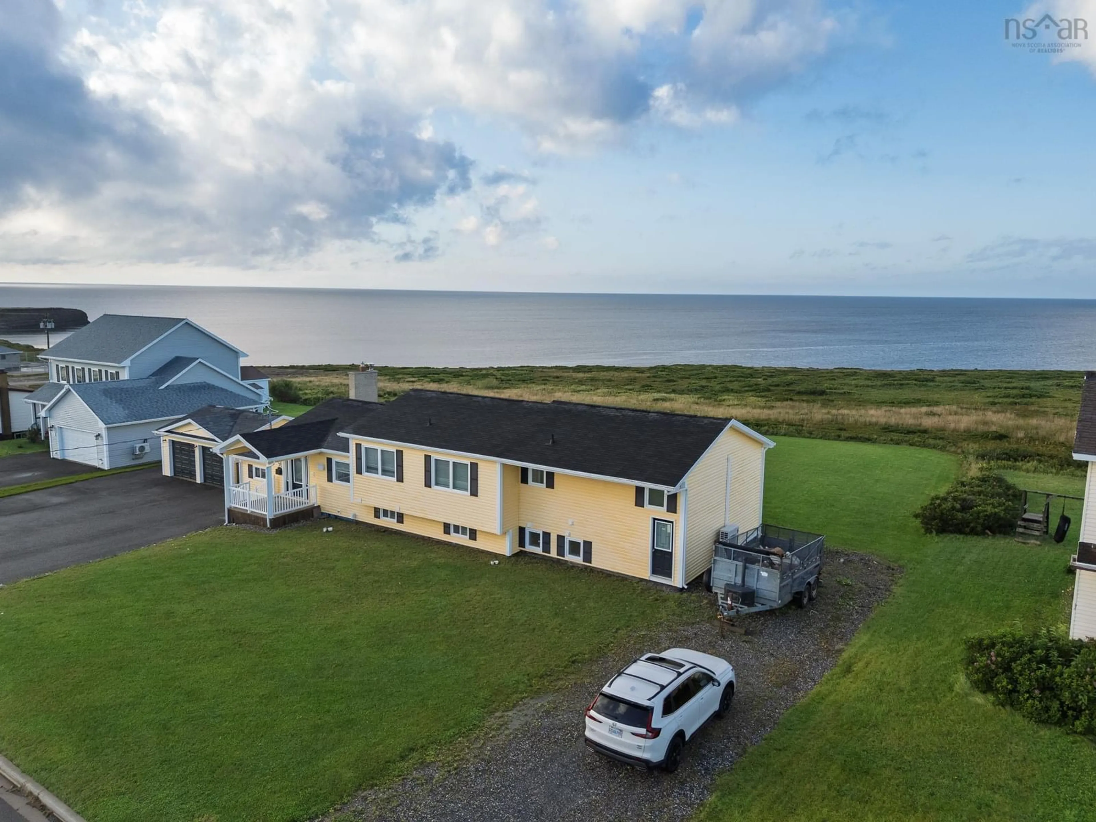 A pic from outside/outdoor area/front of a property/back of a property/a pic from drone, water/lake/river/ocean view for 9 Khalsa Drive, Glace Bay Nova Scotia B1A 5Z1