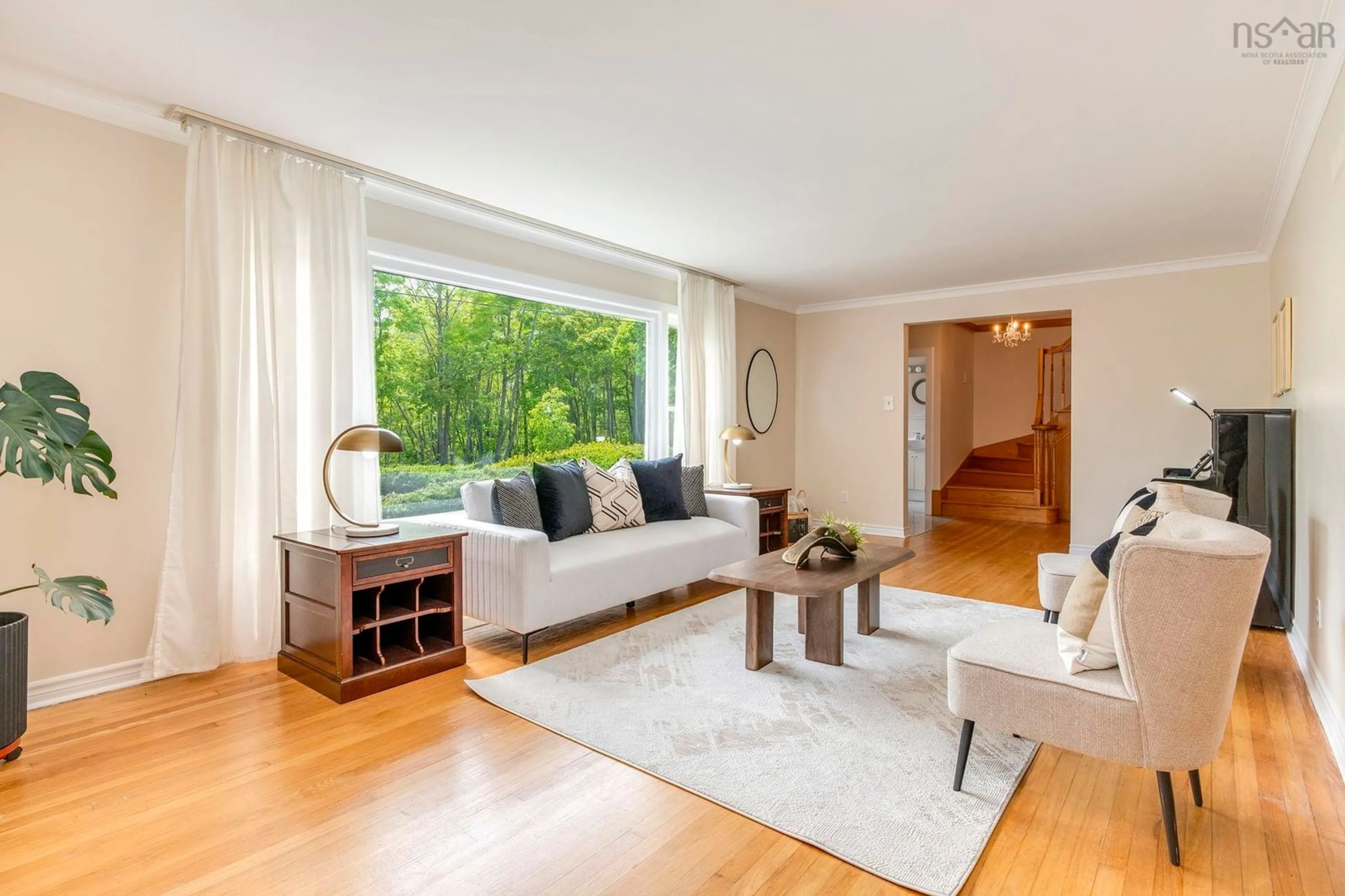 Living room with furniture, wood/laminate floor for 985 Beaufort Ave, Halifax Nova Scotia B3H 3X9