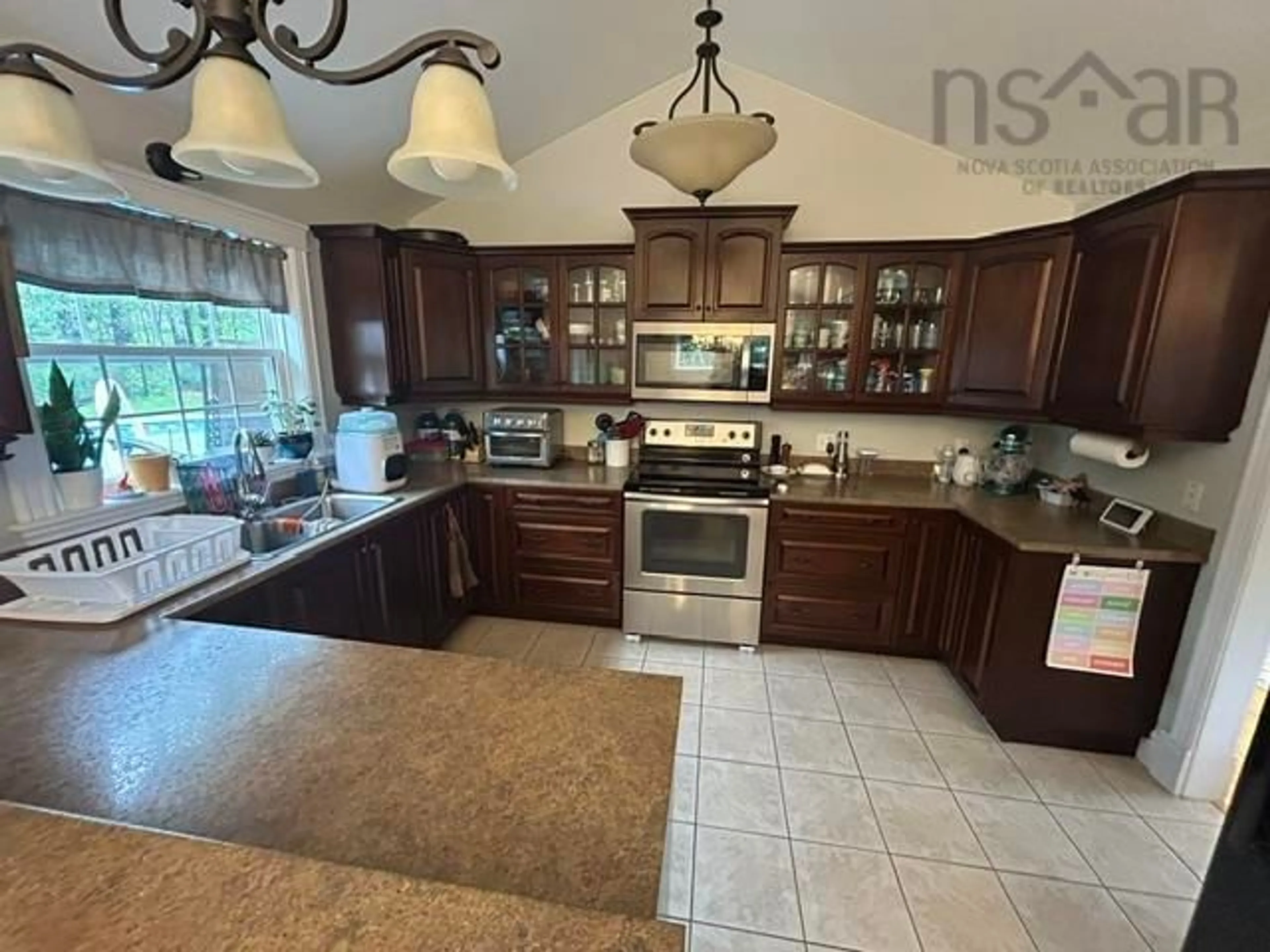 Open concept kitchen, ceramic/tile floor for 243 Kitchener St, Stewiacke Nova Scotia B0N 2J0