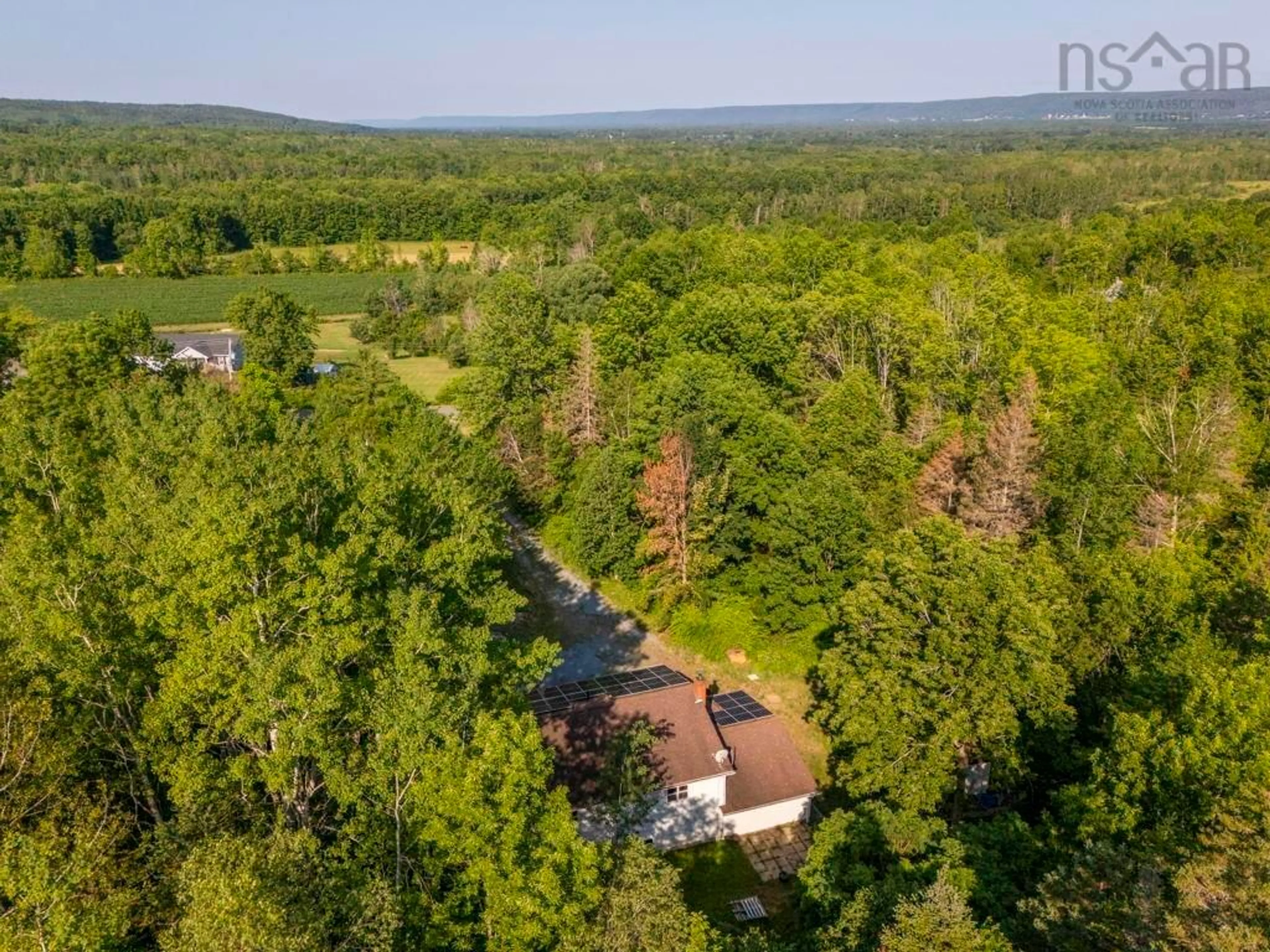 A pic from outside/outdoor area/front of a property/back of a property/a pic from drone, forest/trees view for 40 Mount Hanley Rd, South Williamston Nova Scotia B0P 1S0