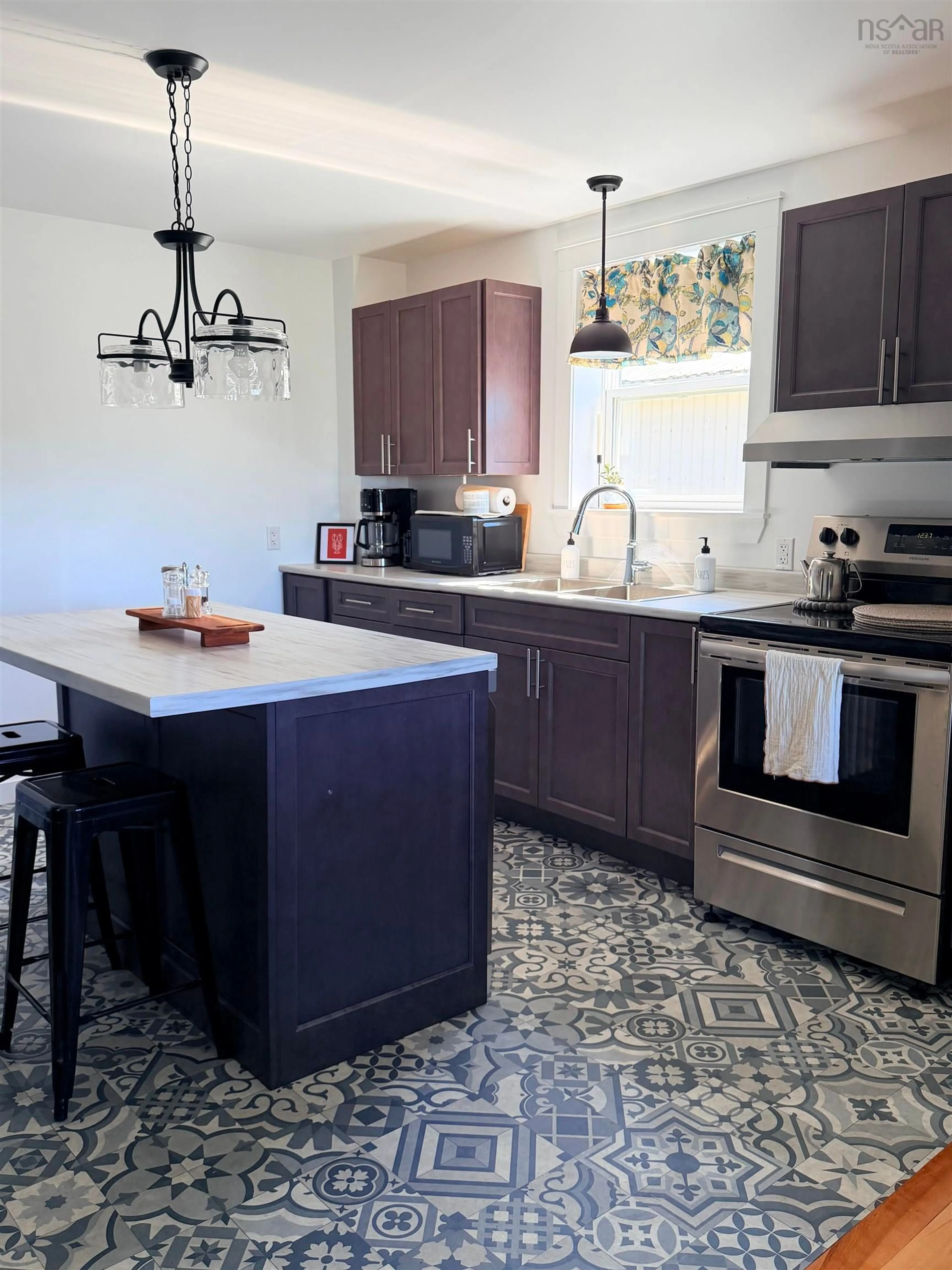Open concept kitchen, ceramic/tile floor for 322 Main St, Port Hood Nova Scotia B0E 2W0