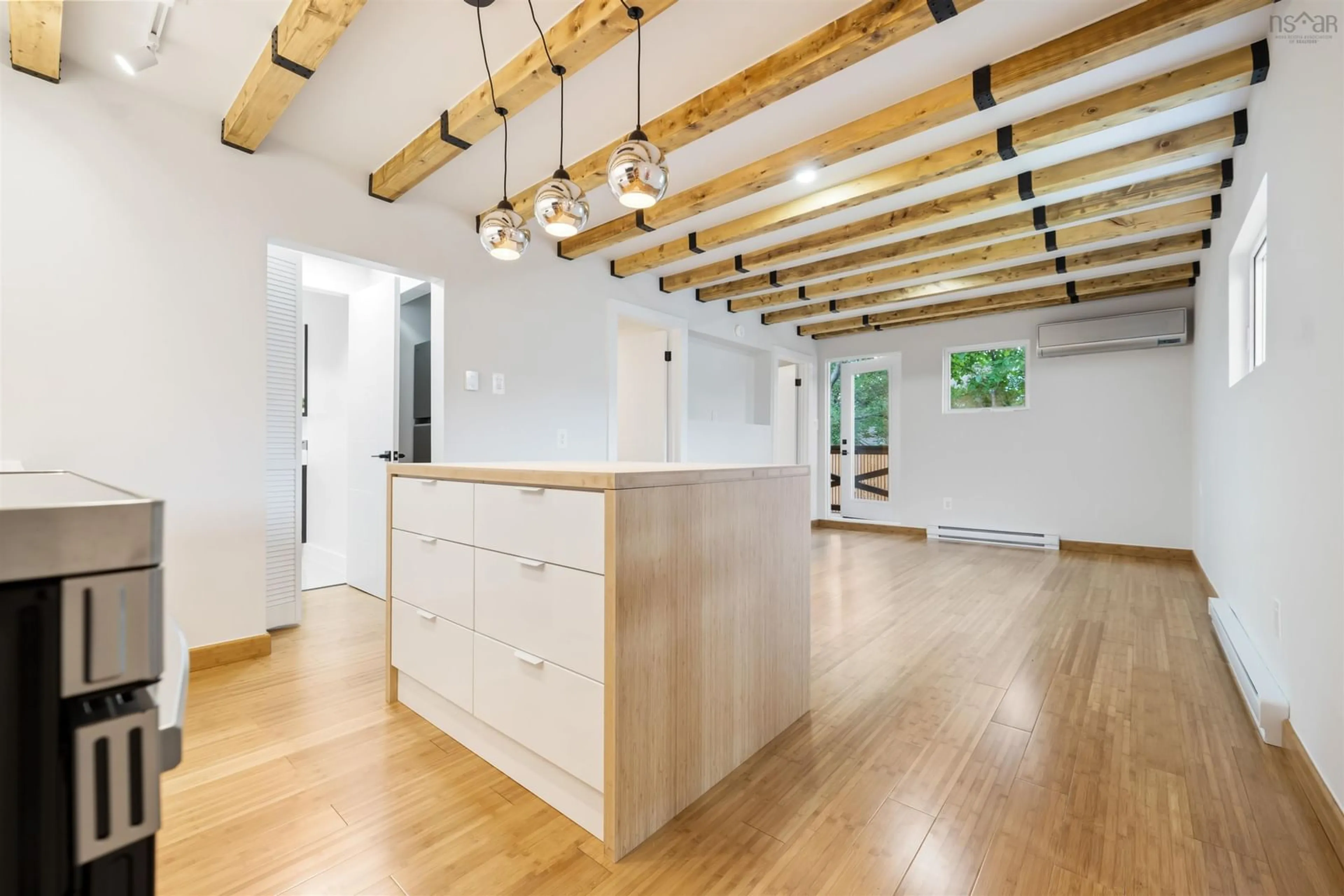 Open concept kitchen, wood/laminate floor for 350-354 Tremont St, New Glasgow Nova Scotia B2H 3Z7