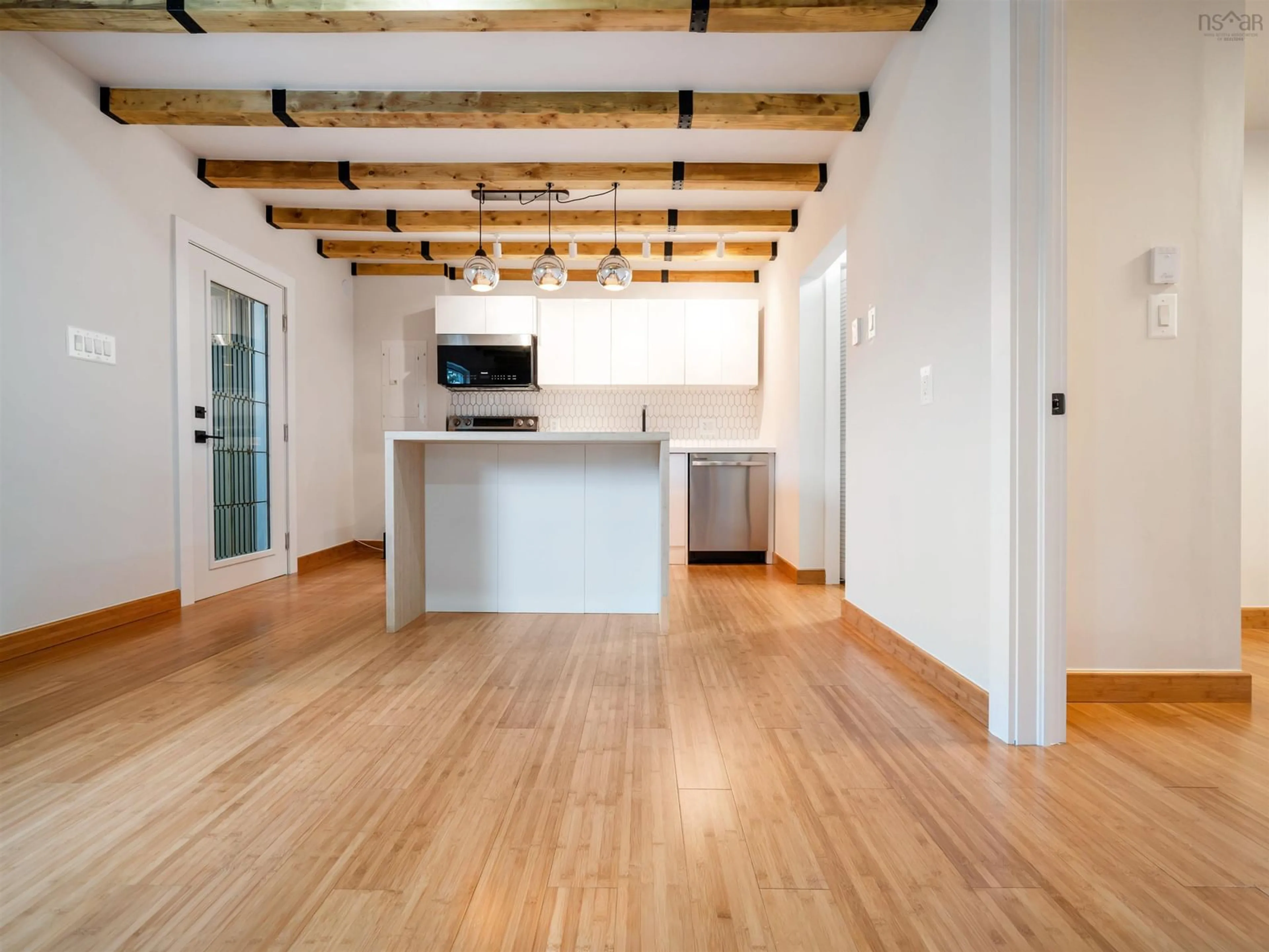 Open concept kitchen, wood/laminate floor for 350-354 Tremont St, New Glasgow Nova Scotia B2H 3Z7