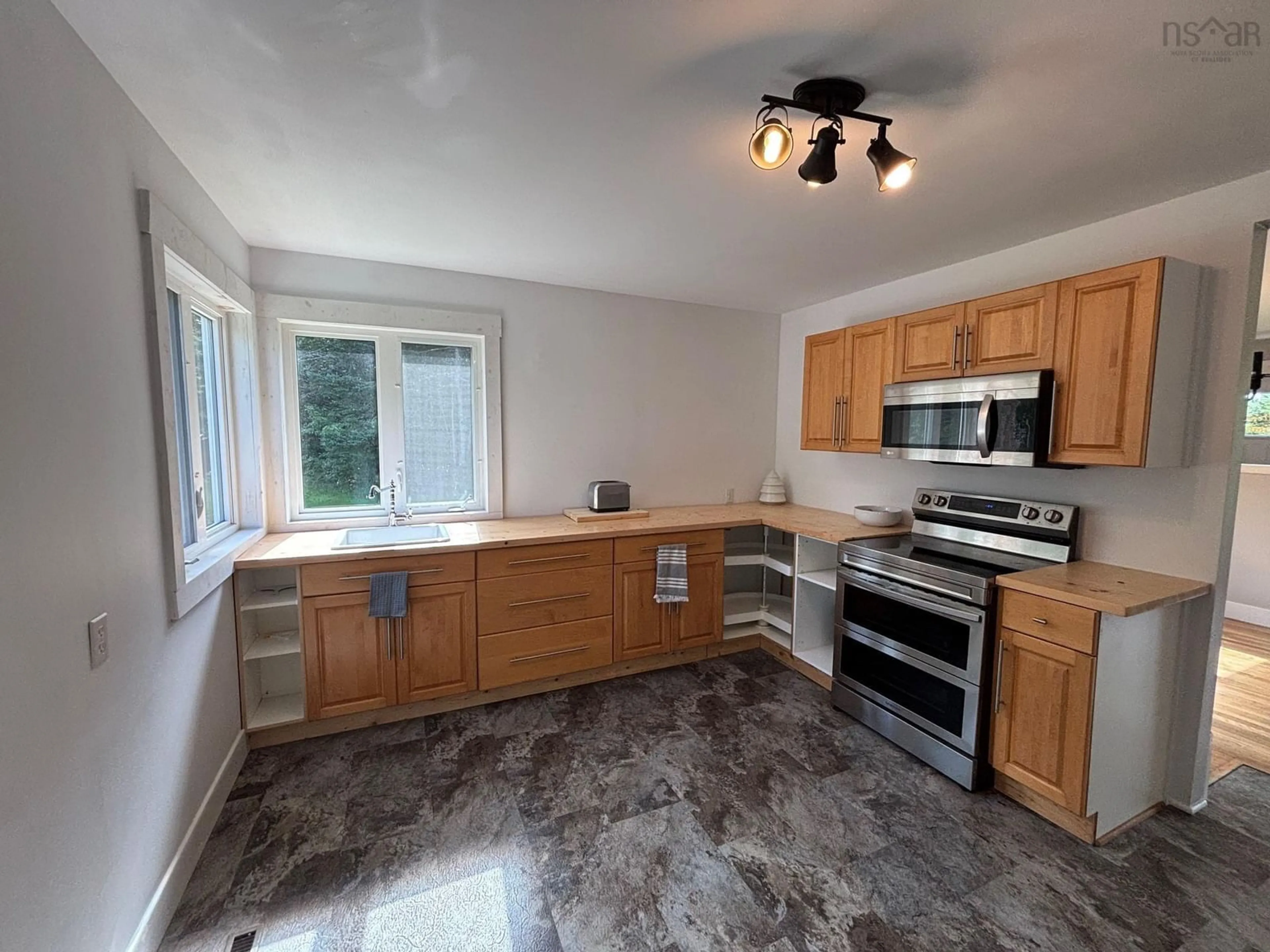 Standard kitchen, ceramic/tile floor for 23519 Highway 7, Watt Section Nova Scotia B0J 3B0
