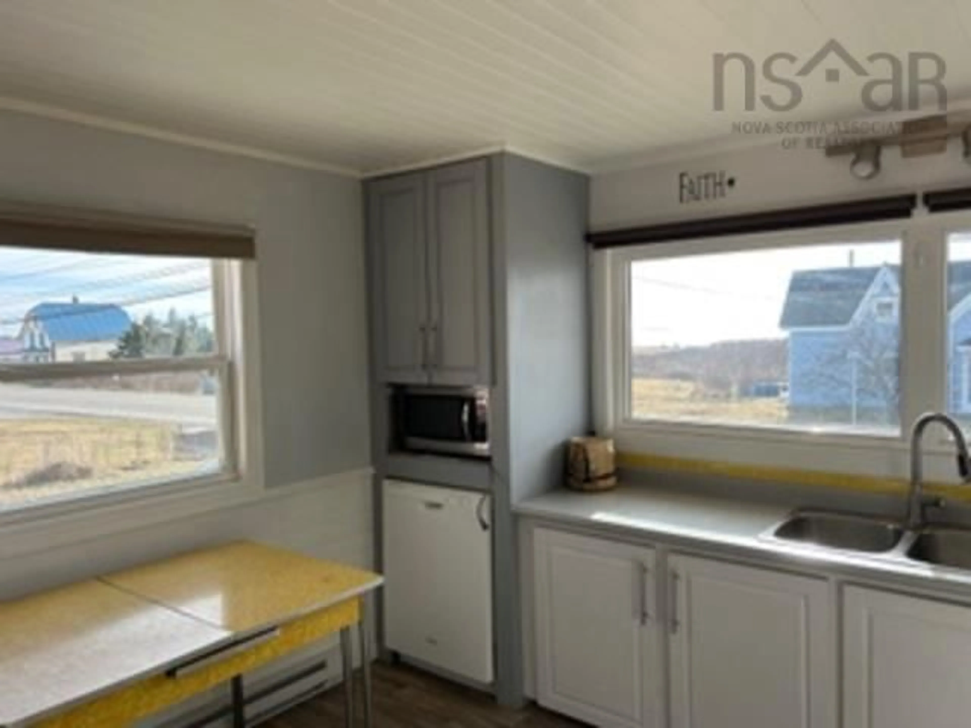 Standard kitchen, wood/laminate floor for 2541 Main St, Clark's Harbour Nova Scotia B0W 1P0