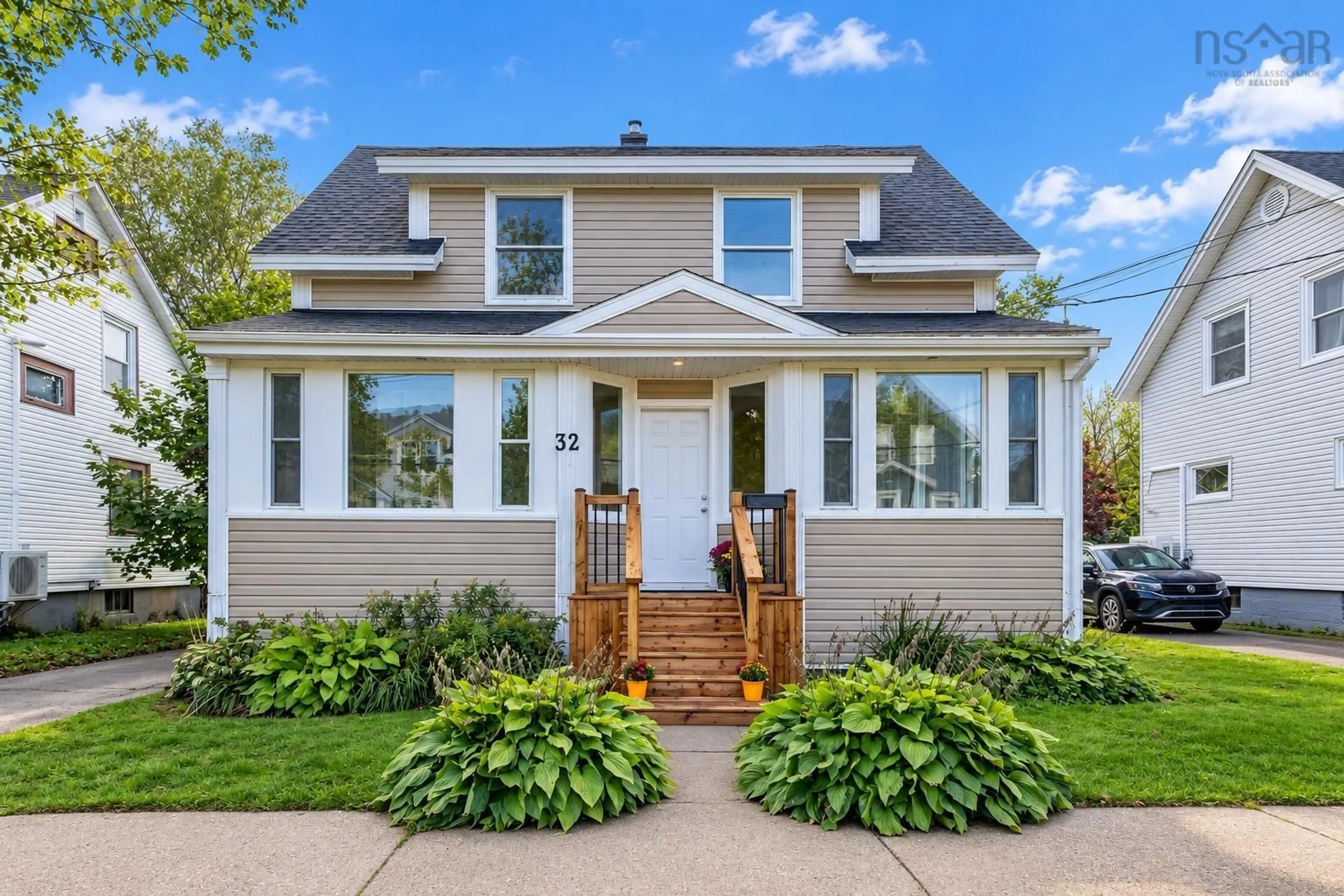 Home with vinyl exterior material, street for 32 St Peters Rd, Sydney Nova Scotia B1P 4P3