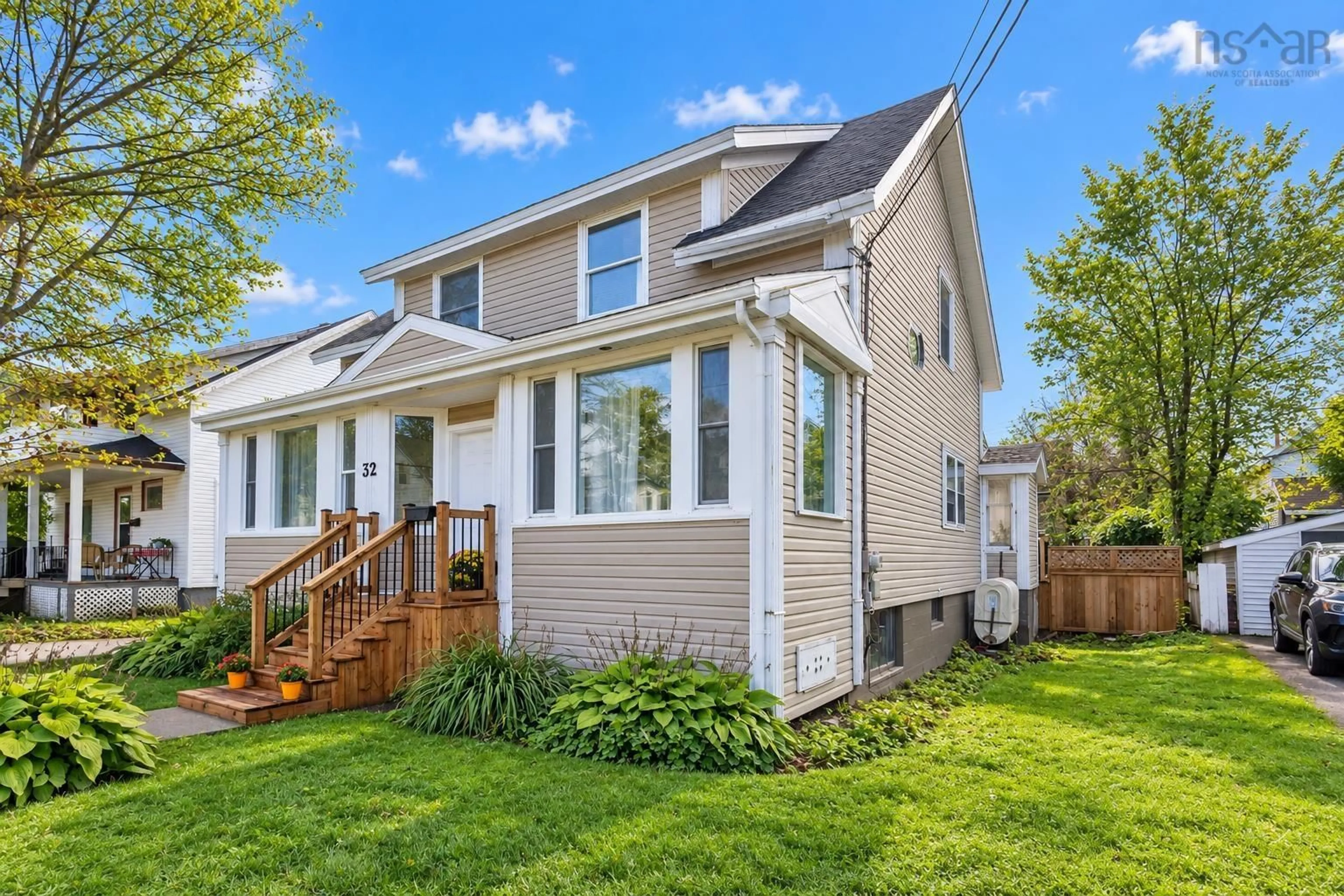 Home with vinyl exterior material, street for 32 St Peters Rd, Sydney Nova Scotia B1P 4P3