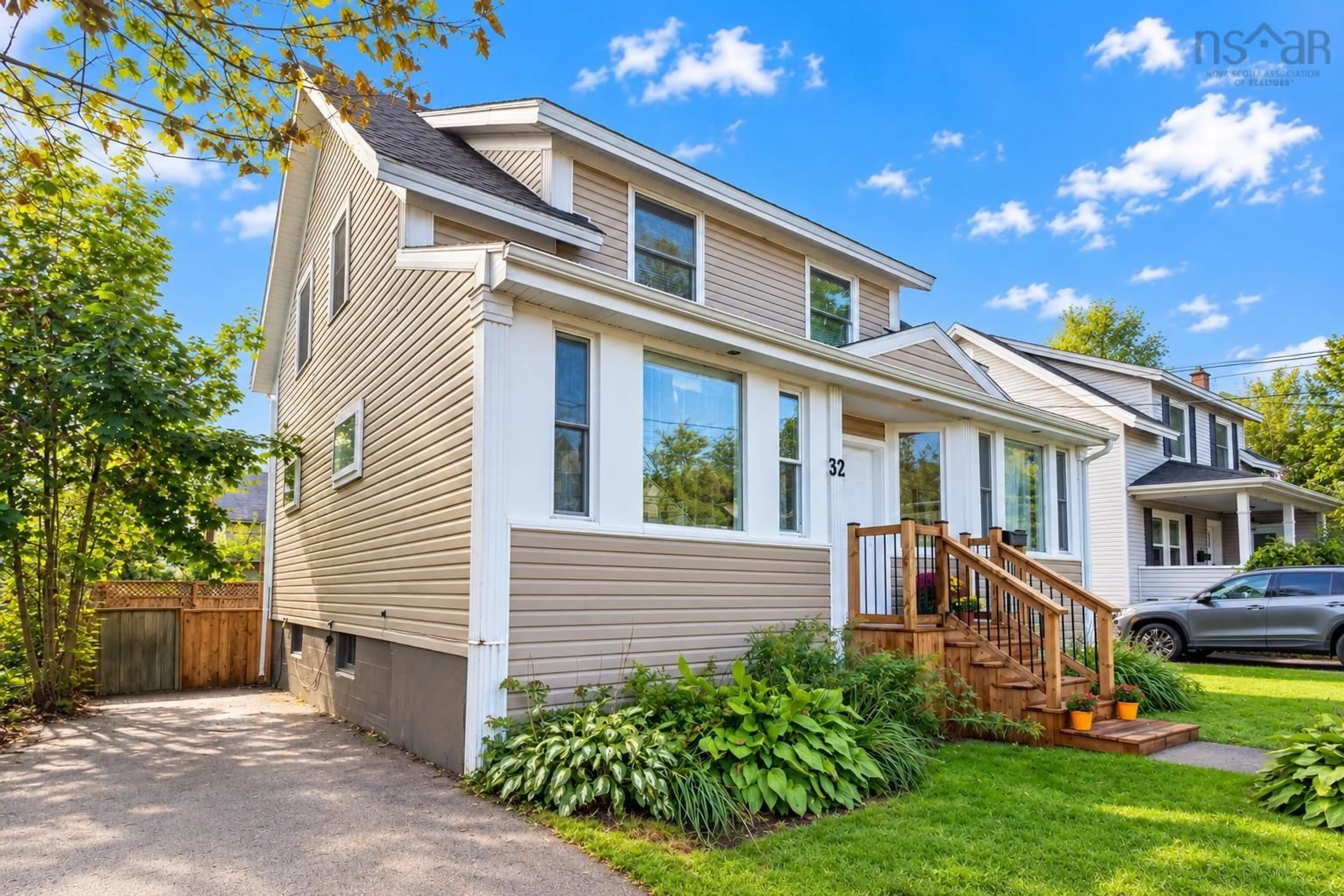 Home with vinyl exterior material, street for 32 St Peters Rd, Sydney Nova Scotia B1P 4P3