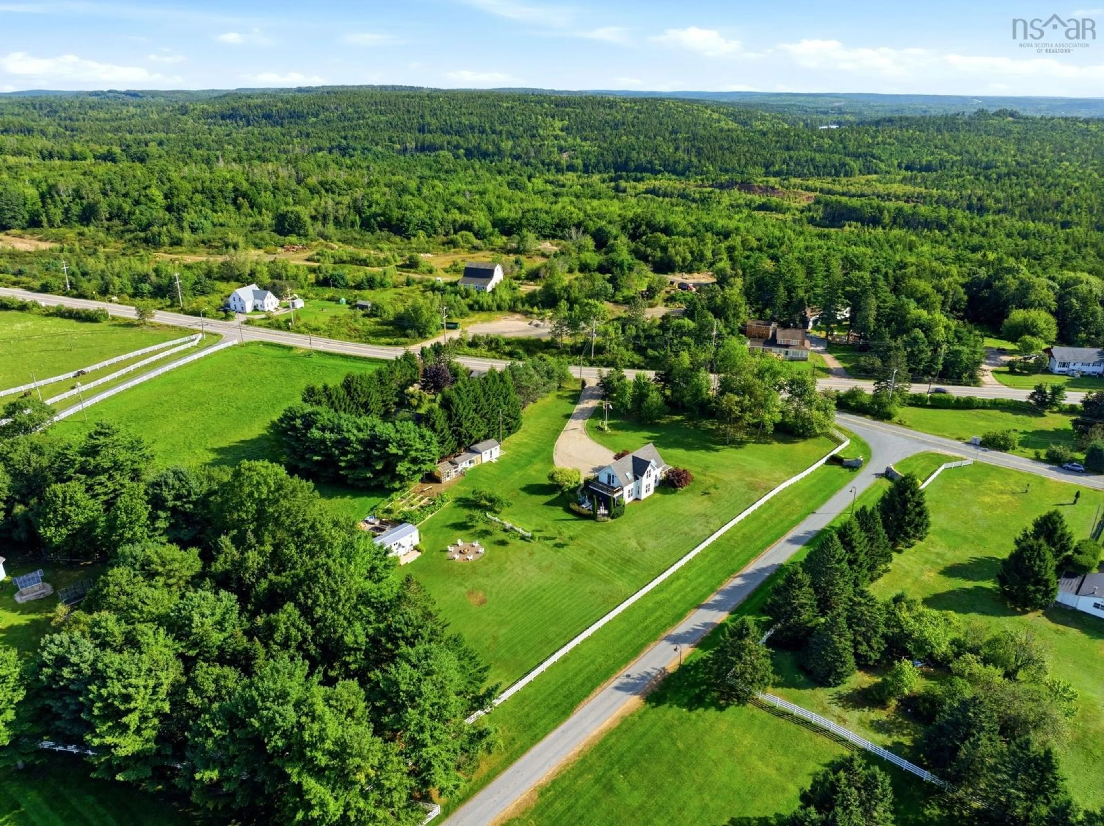 A pic from outside/outdoor area/front of a property/back of a property/a pic from drone, forest/trees view for 4303 3 Hwy, Chester Nova Scotia B0J 1J0