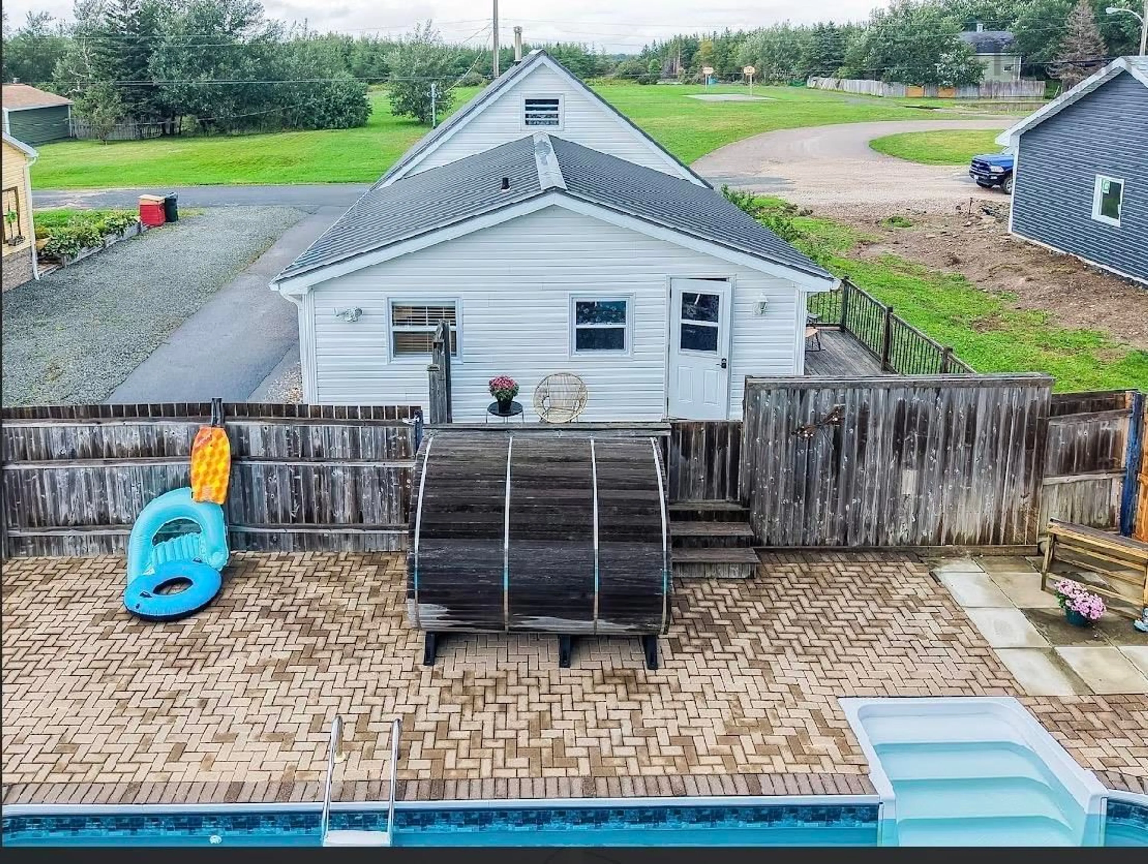 A pic from outside/outdoor area/front of a property/back of a property/a pic from drone, water/lake/river/ocean view for 60 Daley Rd, New Victoria Nova Scotia B1H 4Z4