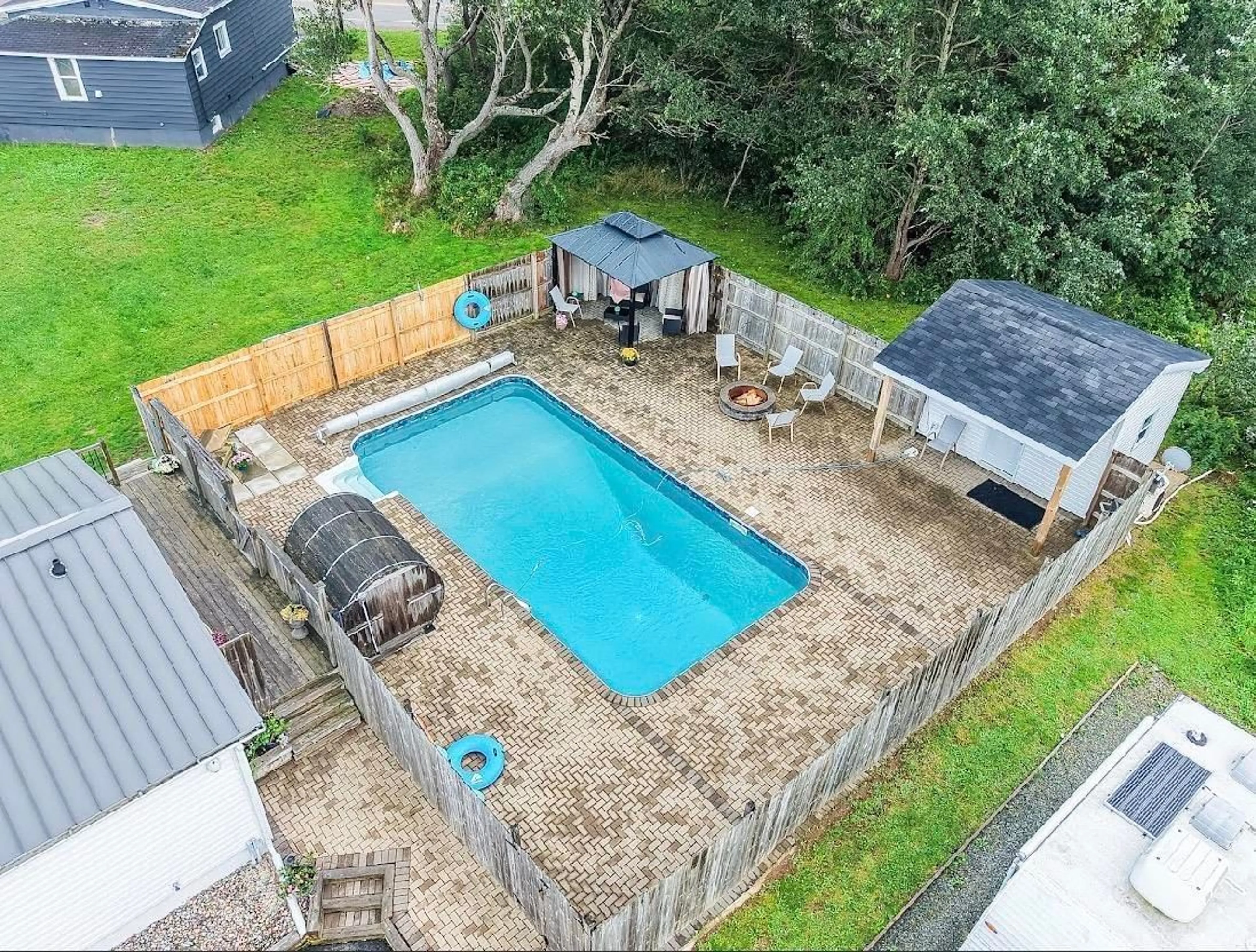 A pic from outside/outdoor area/front of a property/back of a property/a pic from drone, water/lake/river/ocean view for 60 Daley Rd, New Victoria Nova Scotia B1H 4Z4