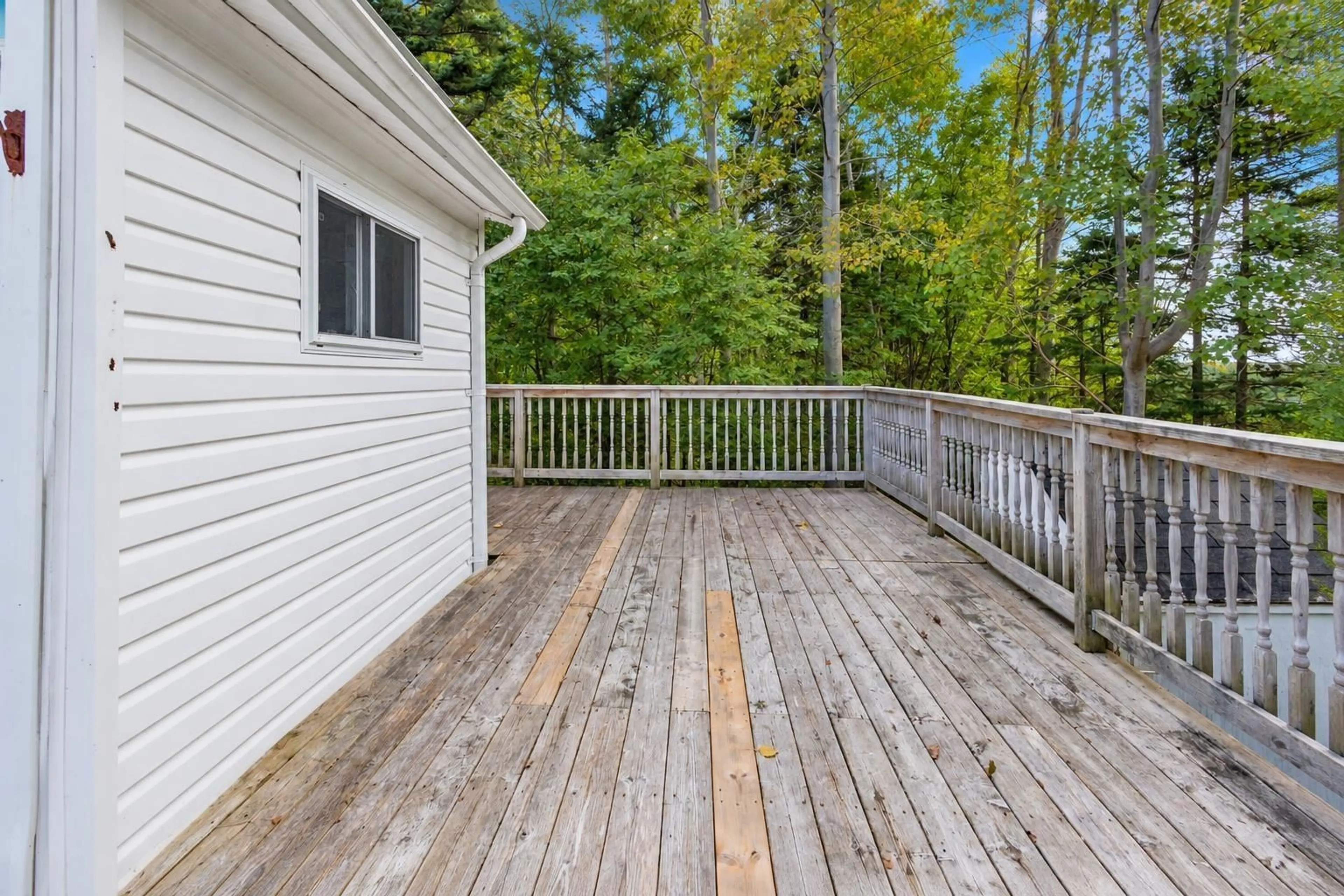 Patio, forest/trees view for 125 Rudderham Rd, Point Edward Nova Scotia B2A 4V4
