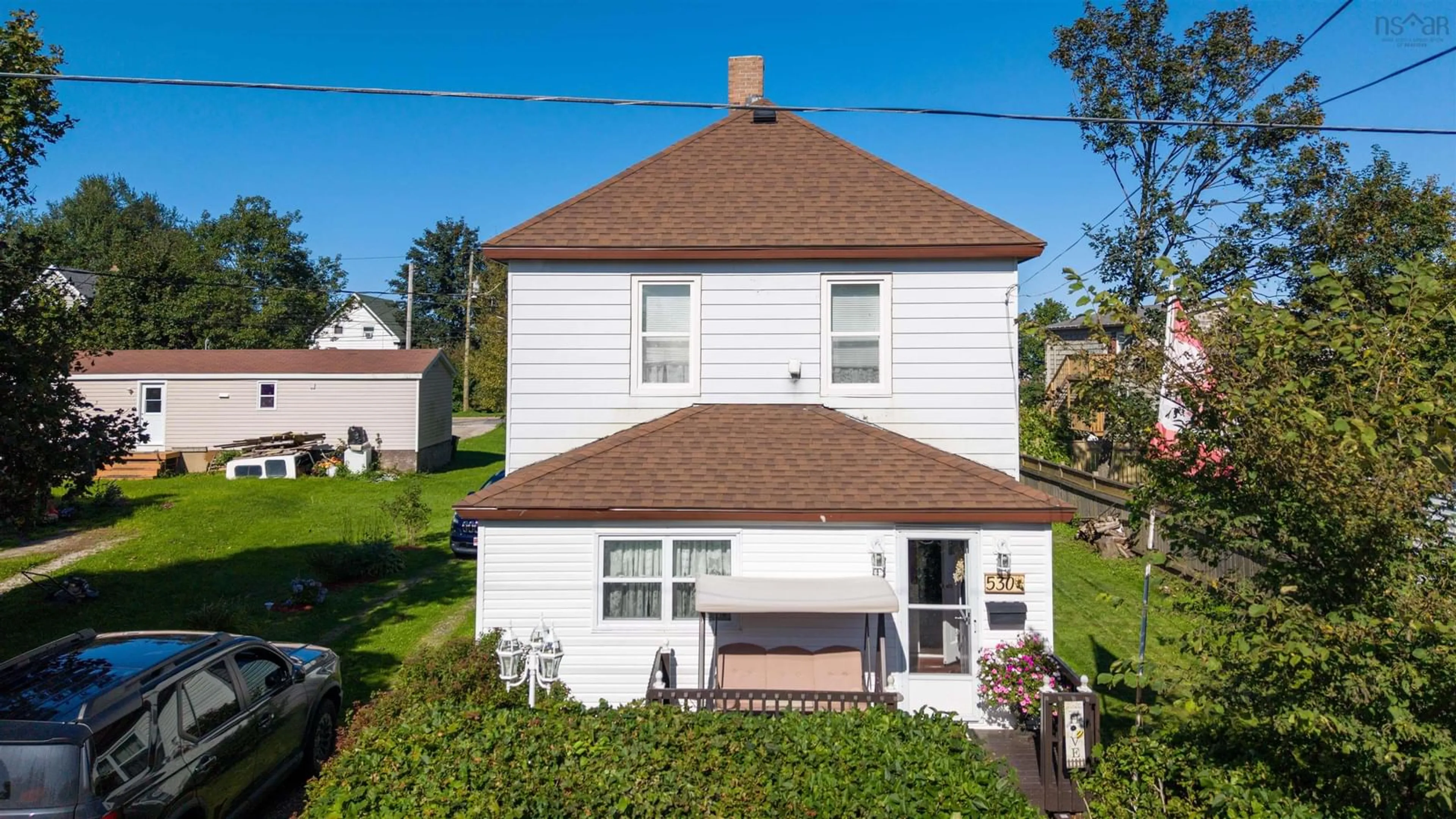 A pic from outside/outdoor area/front of a property/back of a property/a pic from drone, street for 530 Main St, Sydney Mines Nova Scotia B1V 2K6