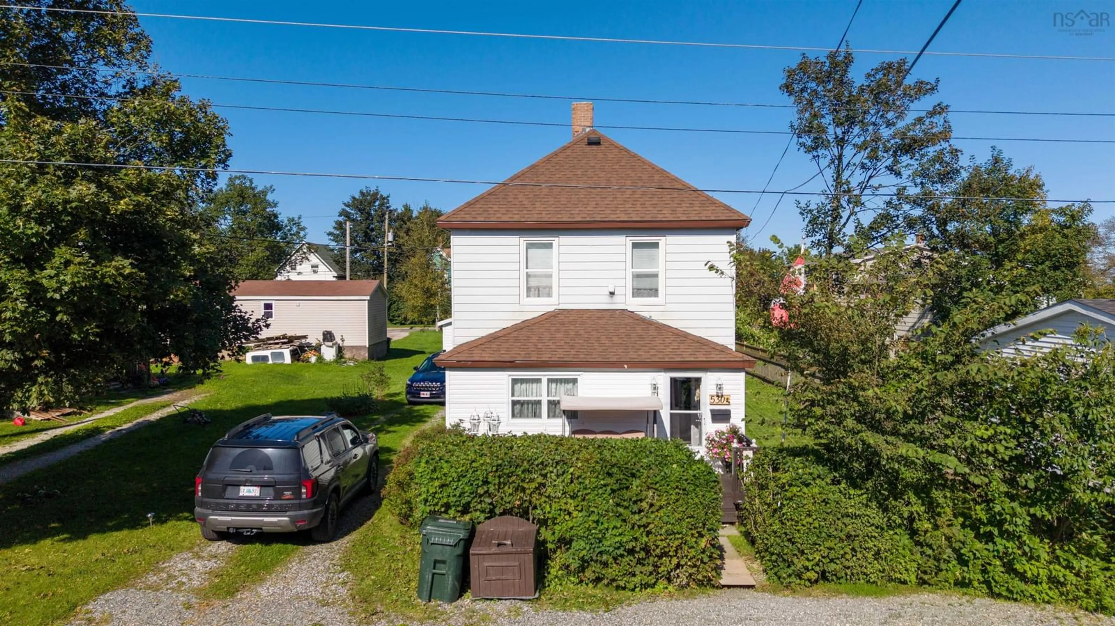 A pic from outside/outdoor area/front of a property/back of a property/a pic from drone, street for 530 Main St, Sydney Mines Nova Scotia B1V 2K6