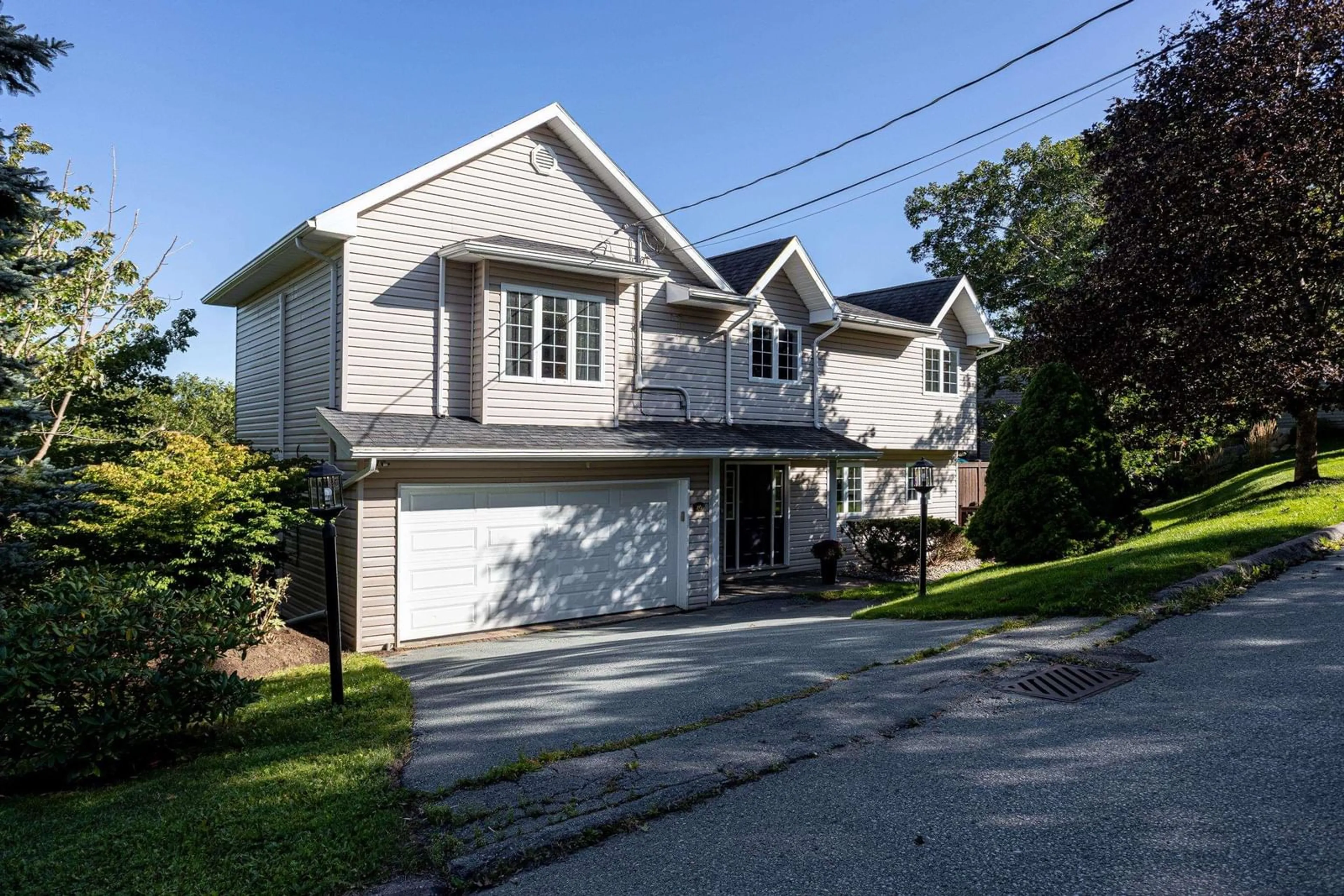 Home with vinyl exterior material, street for 24 Bridgeview Dr, Halifax Nova Scotia B3P 2M4