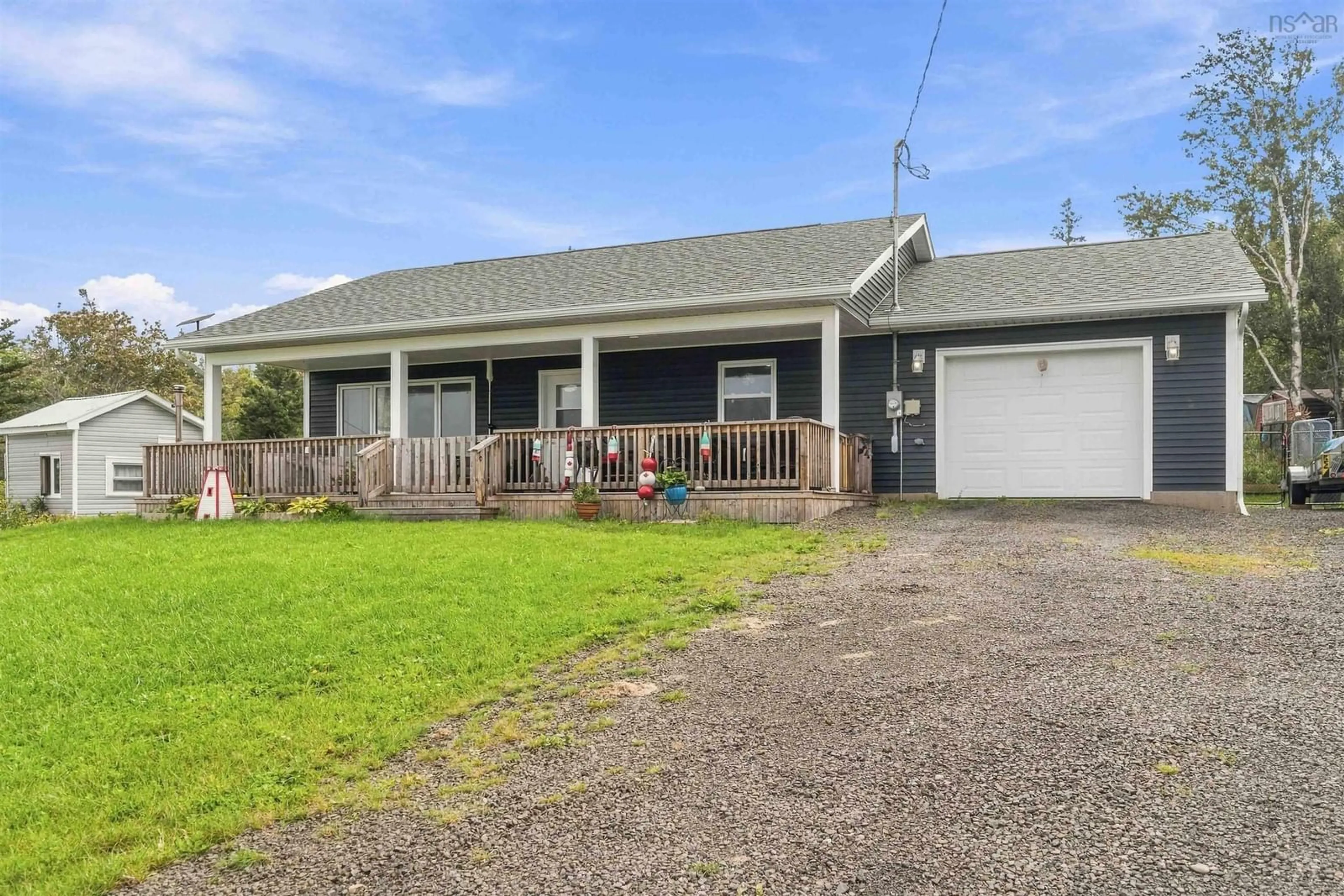 A pic from outside/outdoor area/front of a property/back of a property/a pic from drone, street for 12044 Shore Rd, Cottage Cove Nova Scotia B0S 1P0