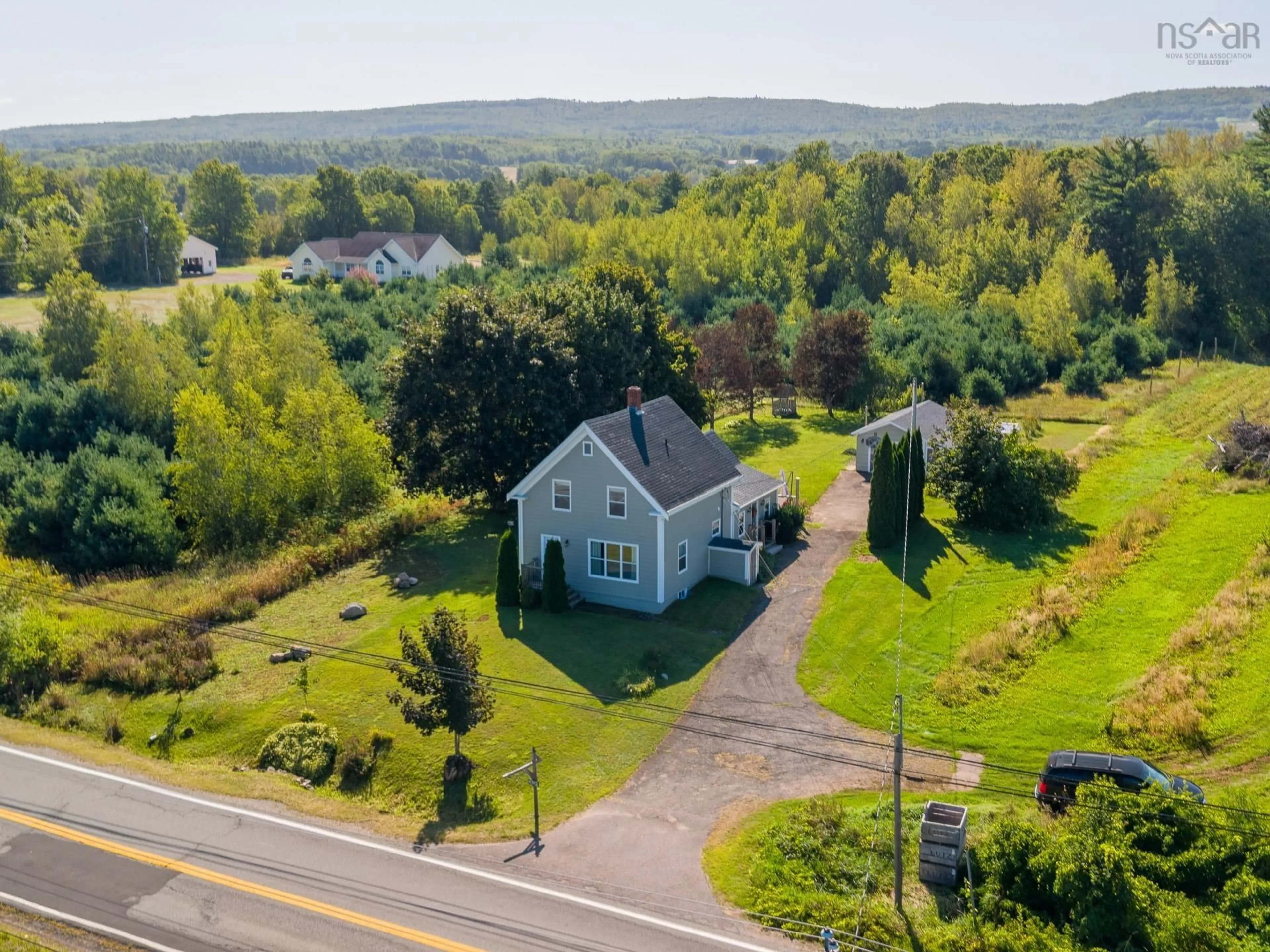 A pic from outside/outdoor area/front of a property/back of a property/a pic from drone, unknown for 4742 Highway 1, South Berwick Nova Scotia B0P 1E0