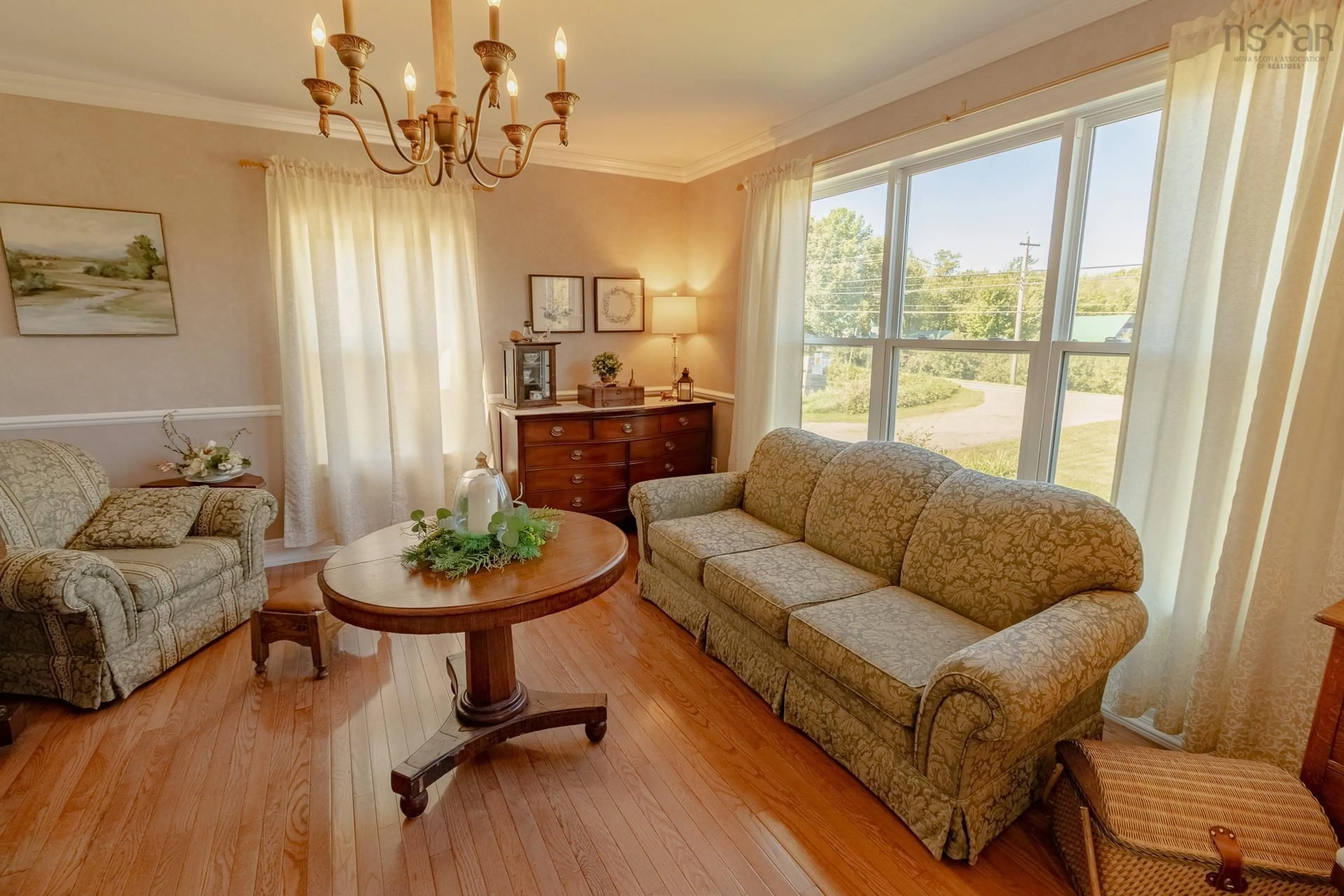 Living room with furniture, wood/laminate floor for 4742 Highway 1, South Berwick Nova Scotia B0P 1E0