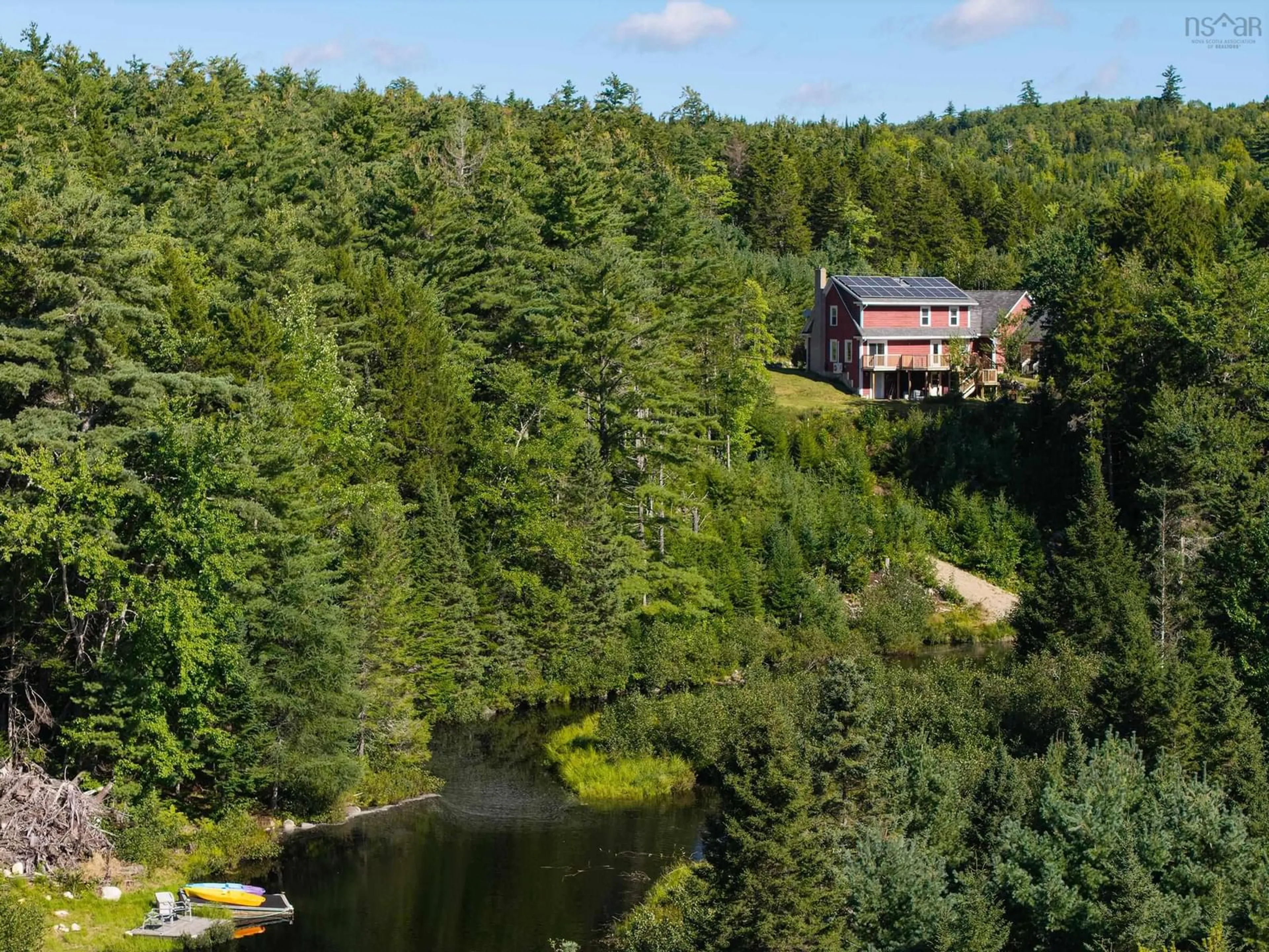 A pic from outside/outdoor area/front of a property/back of a property/a pic from drone, water/lake/river/ocean view for 419 Lakewood Dr, Chester Grant Nova Scotia B0K 1L0