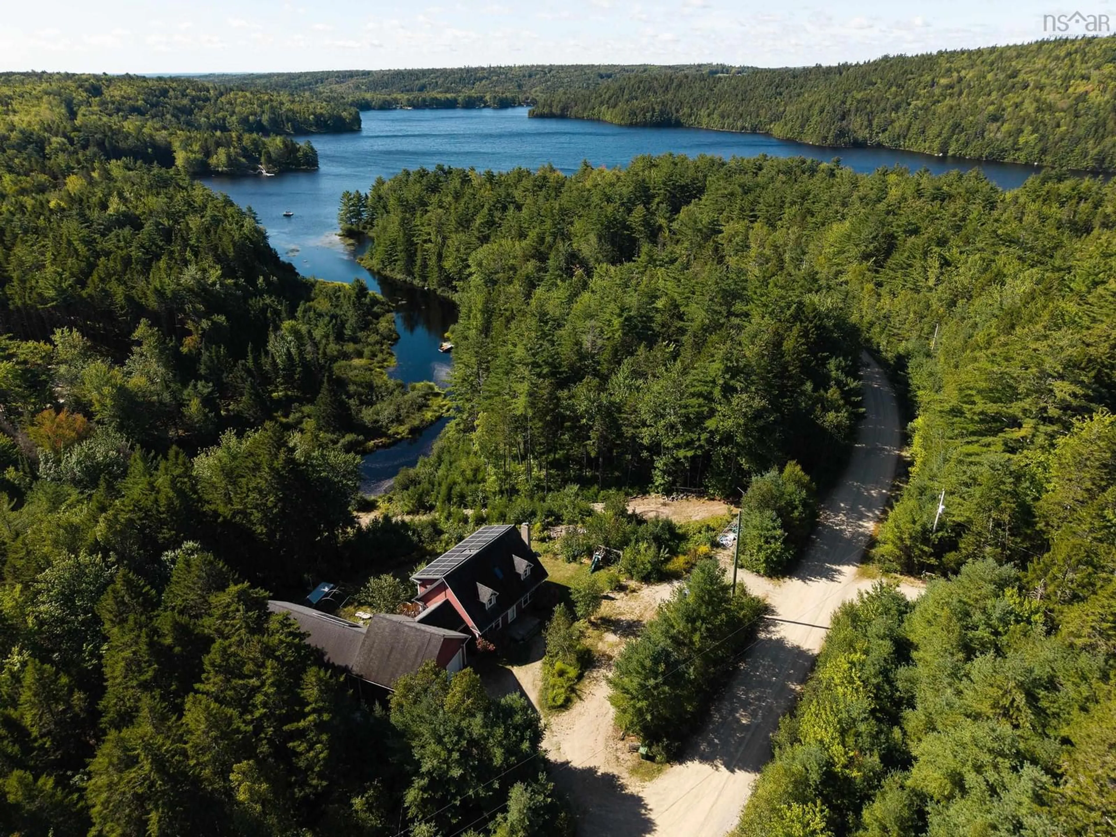 A pic from outside/outdoor area/front of a property/back of a property/a pic from drone, water/lake/river/ocean view for 419 Lakewood Dr, Chester Grant Nova Scotia B0K 1L0
