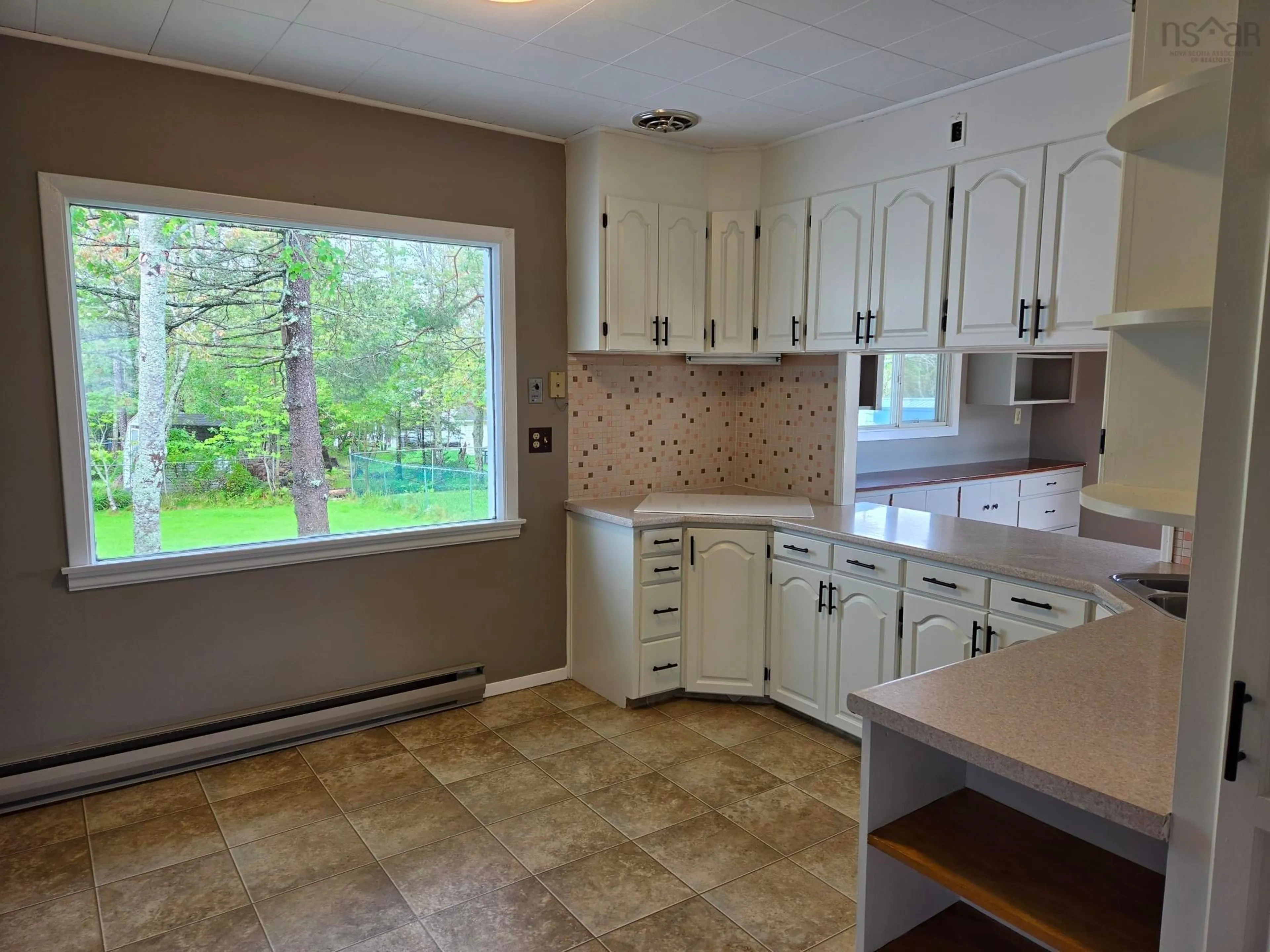 Open concept kitchen, ceramic/tile floor for 80 Curtis Dr, Truro Nova Scotia B2N 3M9