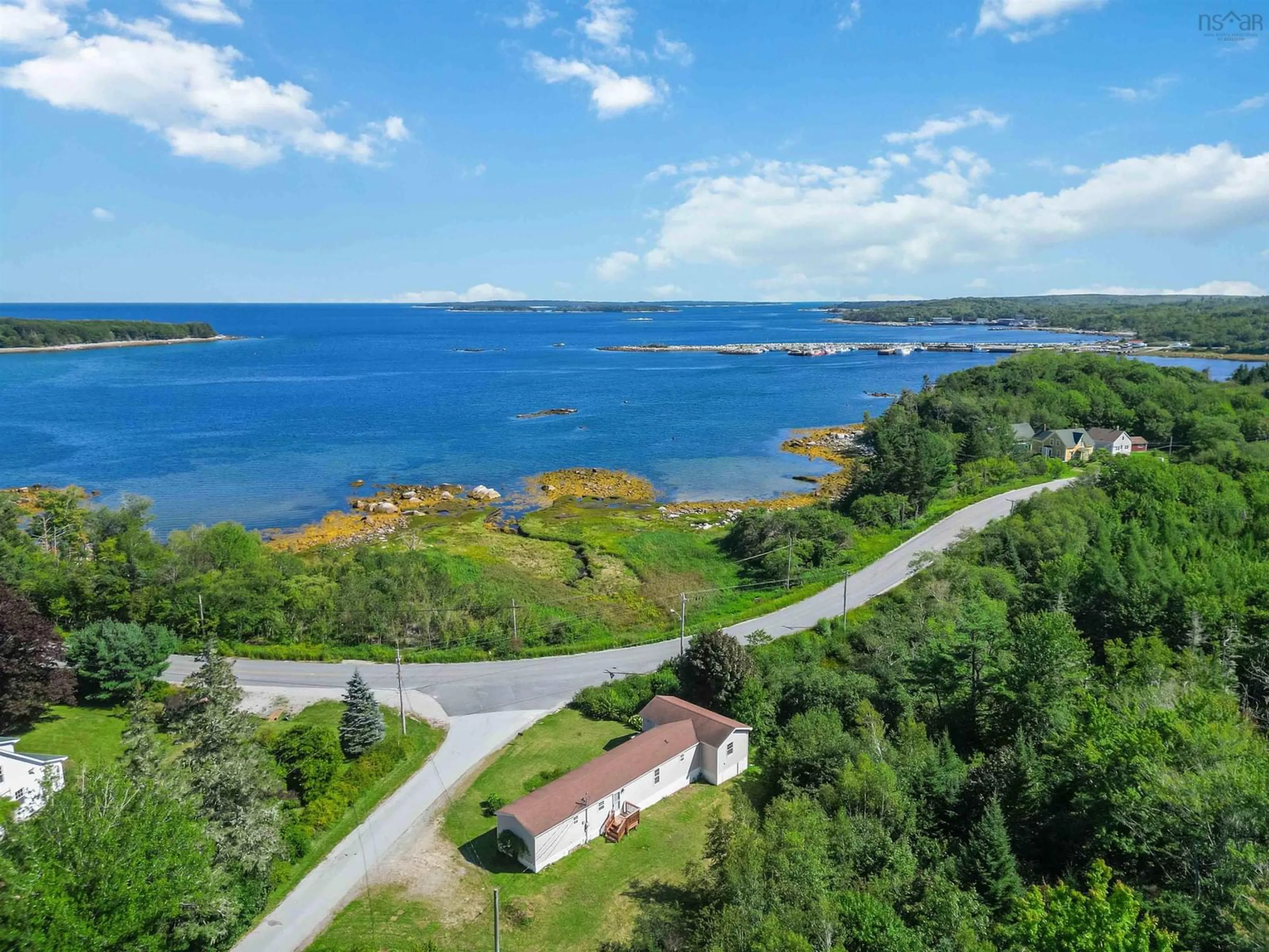 A pic from outside/outdoor area/front of a property/back of a property/a pic from drone, water/lake/river/ocean view for 24 Chimney Rd, Port Mouton Nova Scotia B0T 1T0