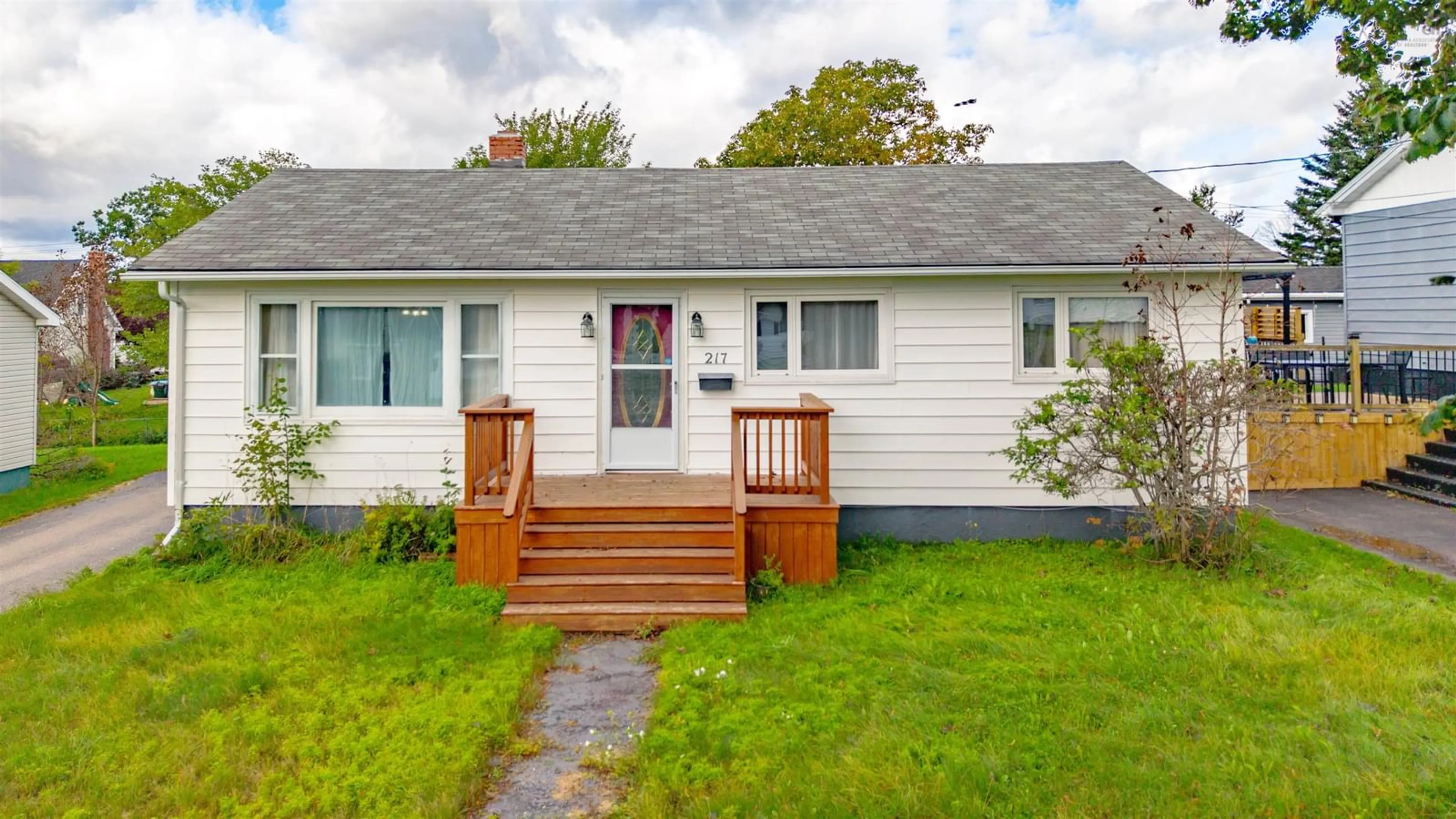 Home with vinyl exterior material, street for 217 Cusack Dr, Sydney Nova Scotia B1P 3W8