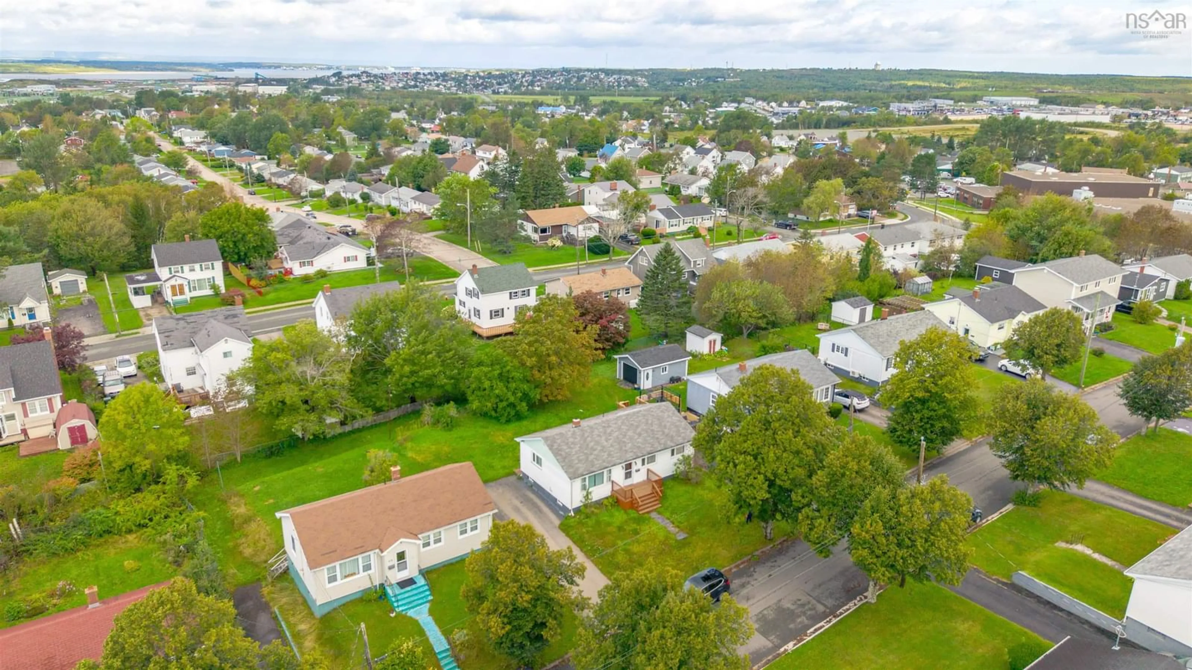 A pic from outside/outdoor area/front of a property/back of a property/a pic from drone, water/lake/river/ocean view for 217 Cusack Dr, Sydney Nova Scotia B1P 3W8
