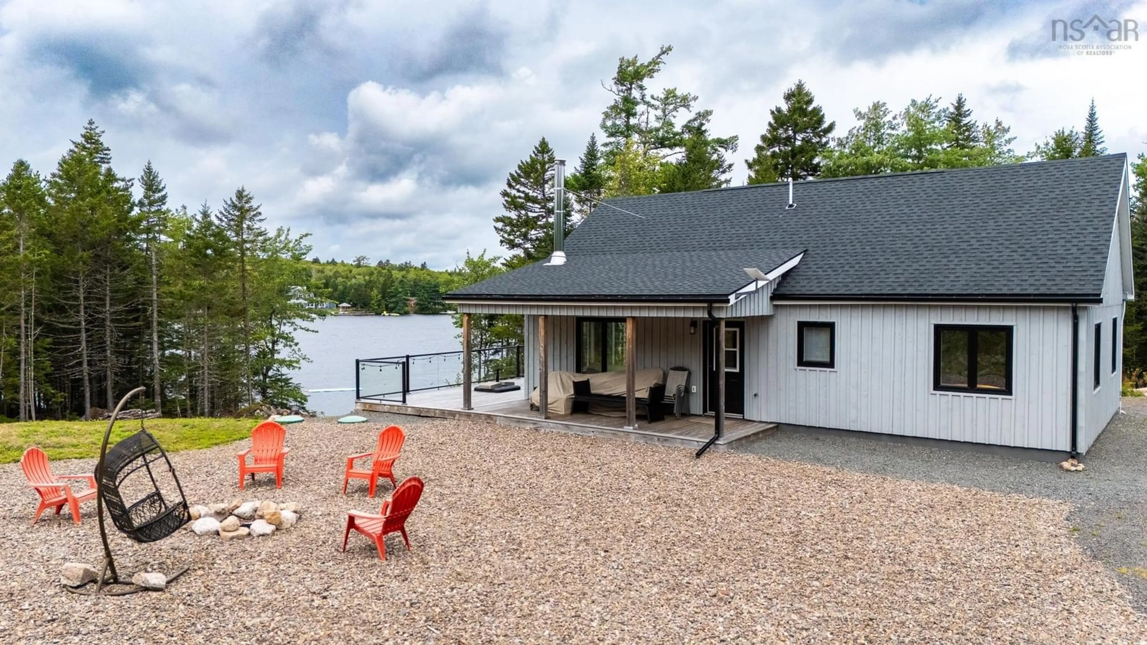 A pic from outside/outdoor area/front of a property/back of a property/a pic from drone, water/lake/river/ocean view for 411 Granite Lane, Aylesford Lake Nova Scotia B4P 3V8