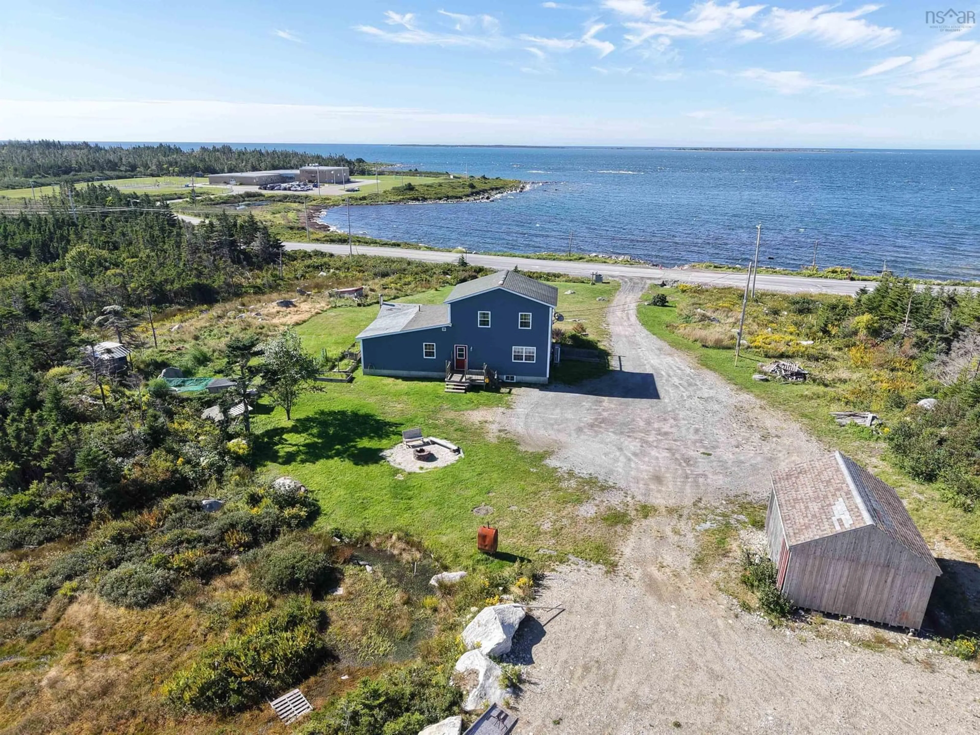 A pic from outside/outdoor area/front of a property/back of a property/a pic from drone, water/lake/river/ocean view for 5966 Highway 3, Shag Harbour Nova Scotia B0W 2B0