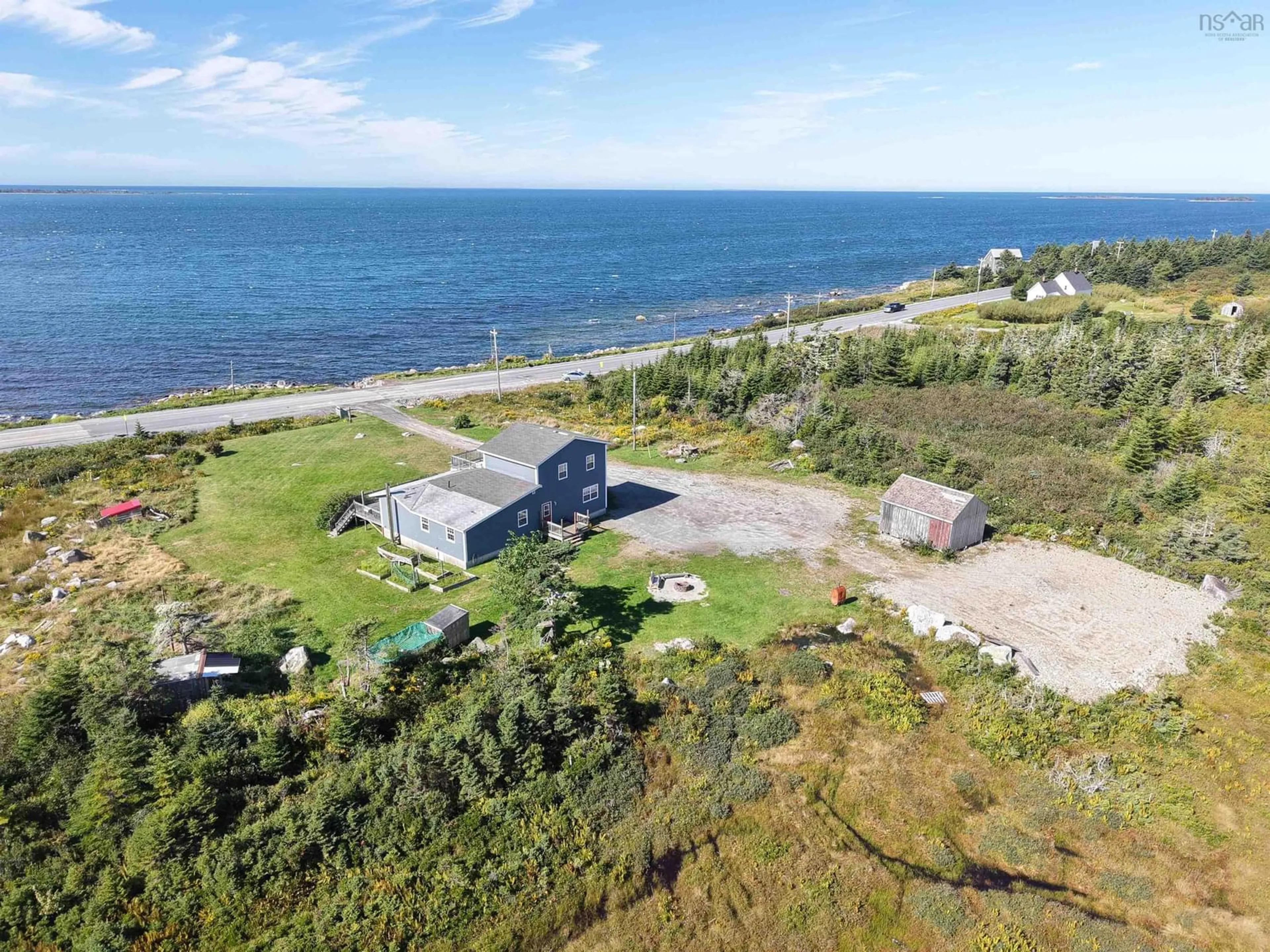 A pic from outside/outdoor area/front of a property/back of a property/a pic from drone, water/lake/river/ocean view for 5966 Highway 3, Shag Harbour Nova Scotia B0W 2B0