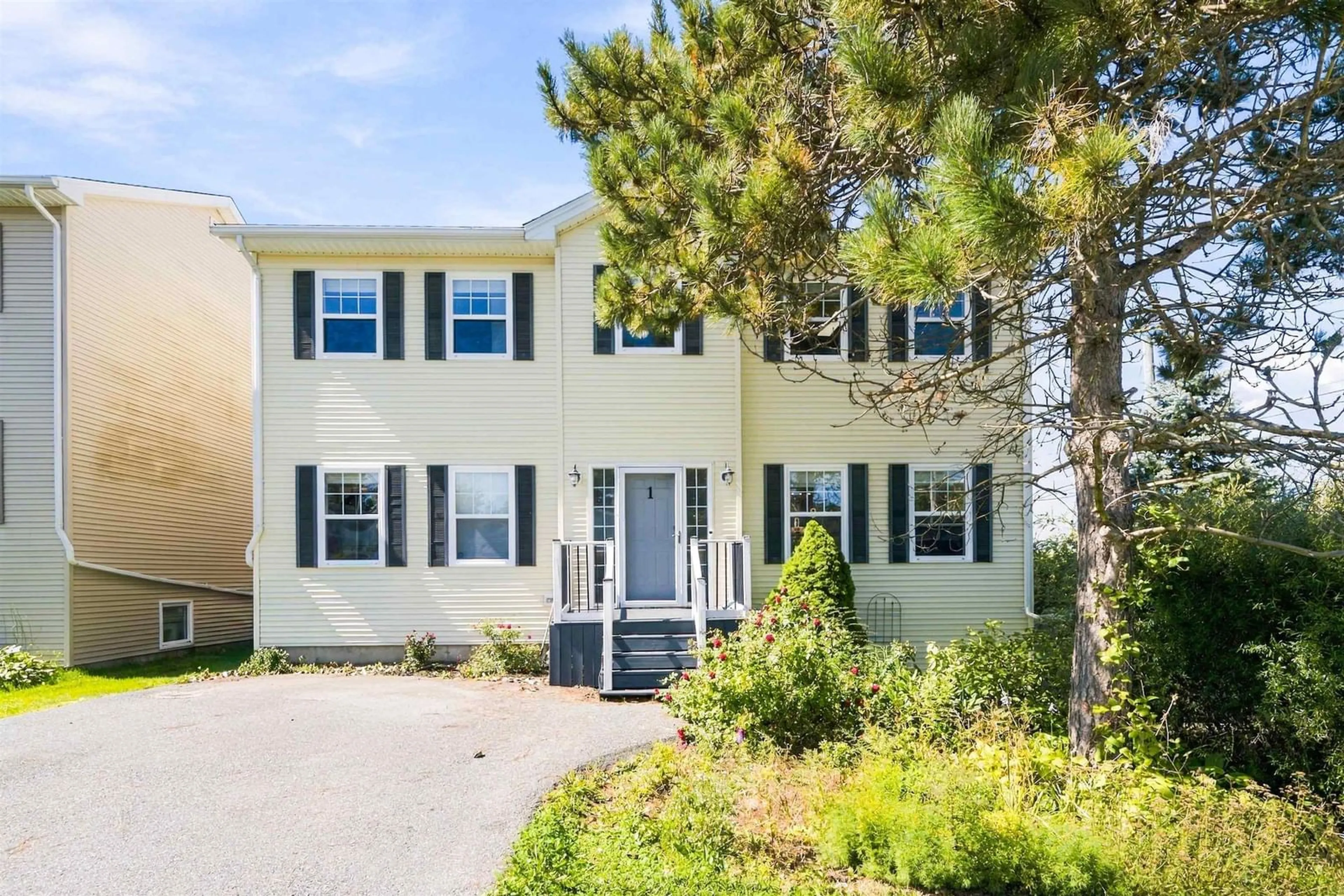 Home with vinyl exterior material, street for 1 Gordon St, Bedford Nova Scotia B4A 2N6