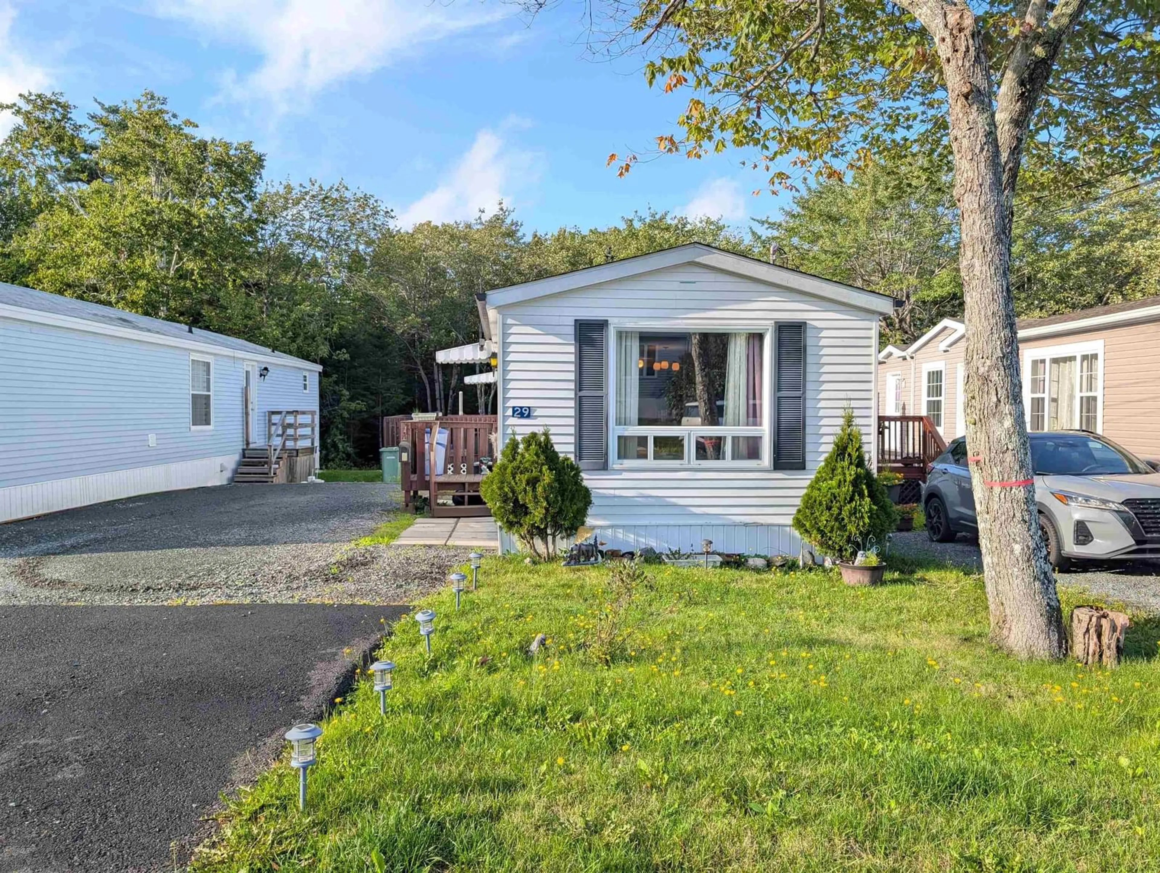 Home with vinyl exterior material, street for 29 Broadway St, Lakeside Nova Scotia B3T 1B1
