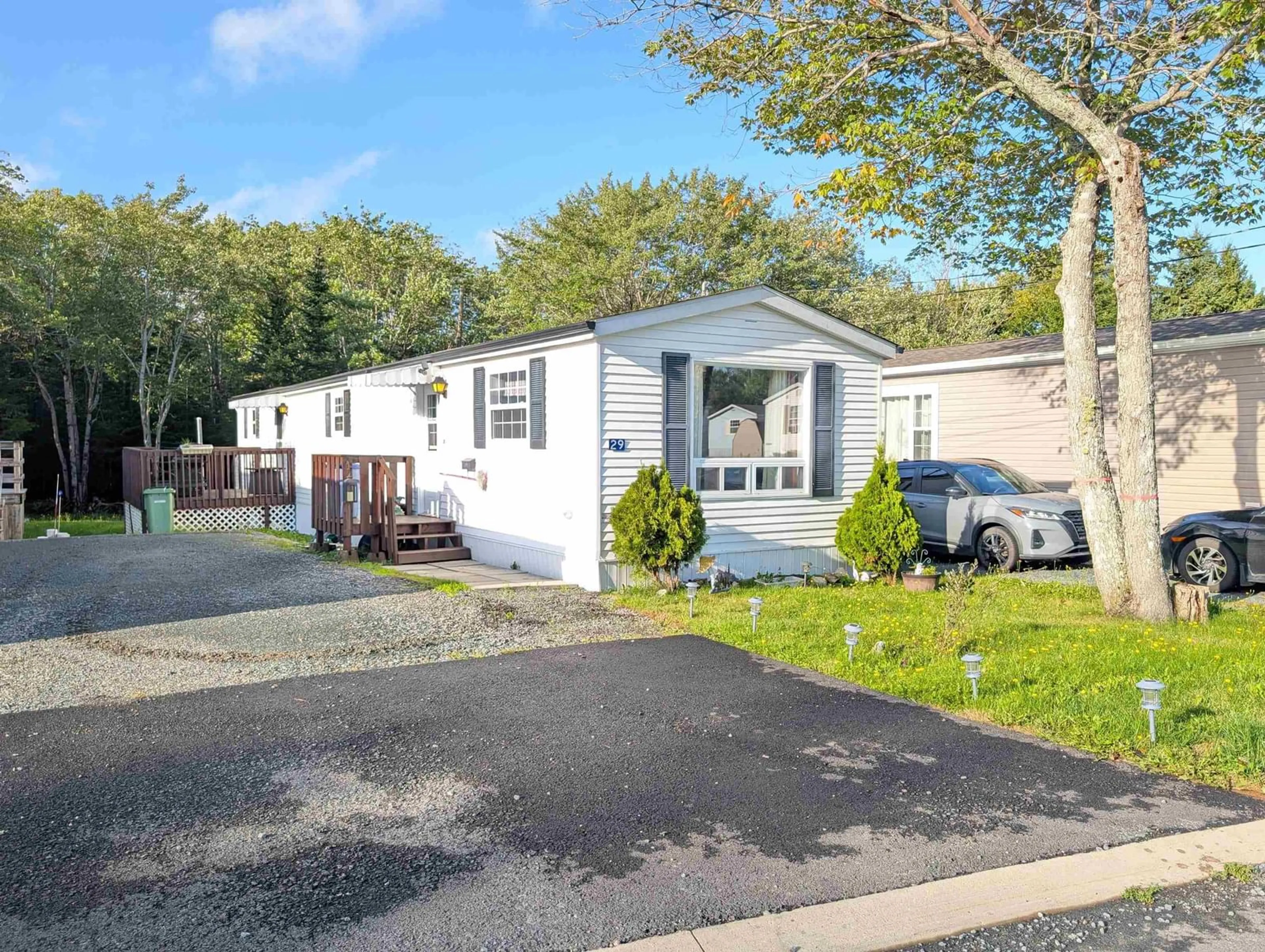 Home with vinyl exterior material, street for 29 Broadway St, Lakeside Nova Scotia B3T 1B1