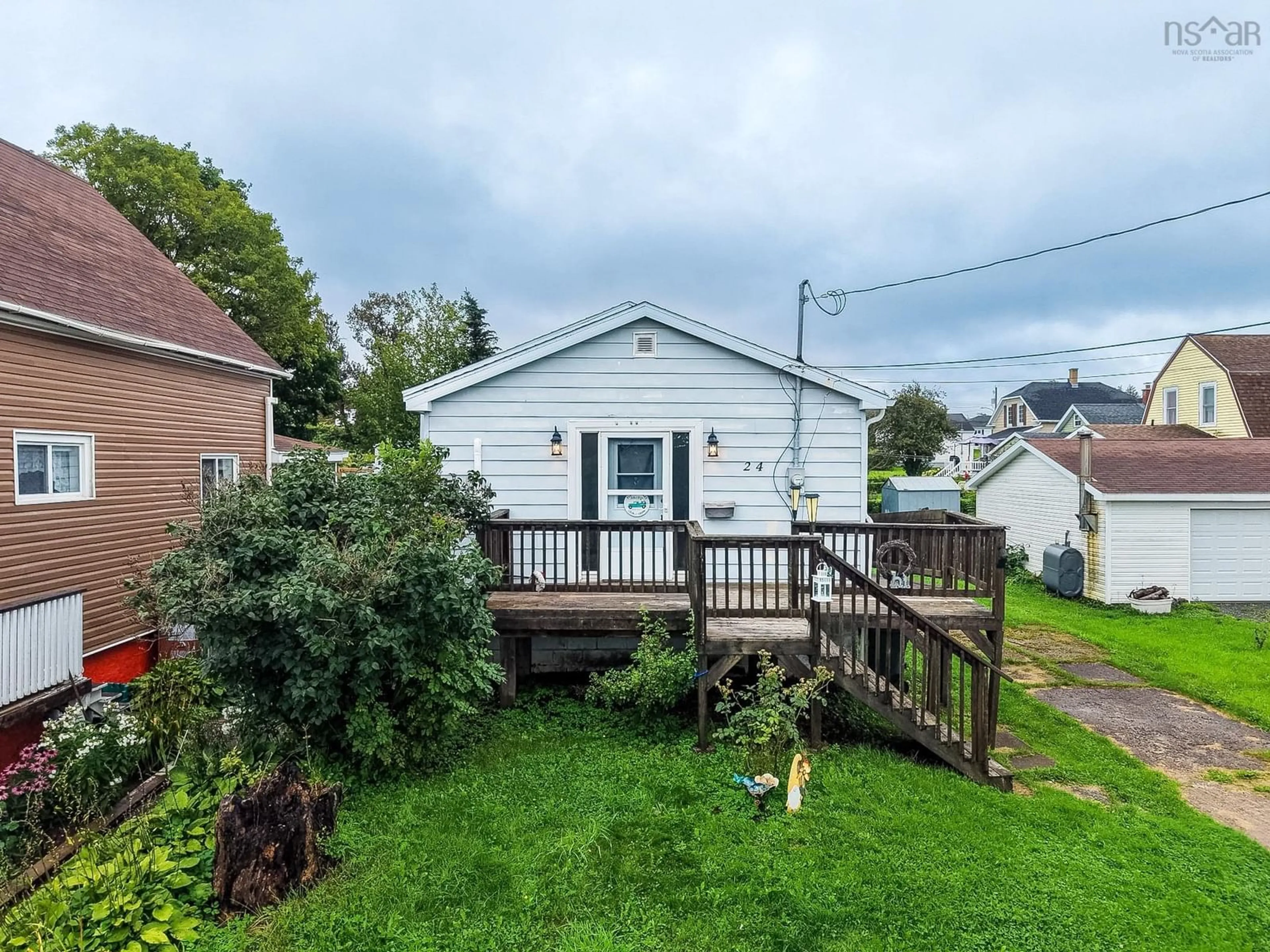 A pic from outside/outdoor area/front of a property/back of a property/a pic from drone, street for Beech St #24, Sydney Nova Scotia B1P 3B4