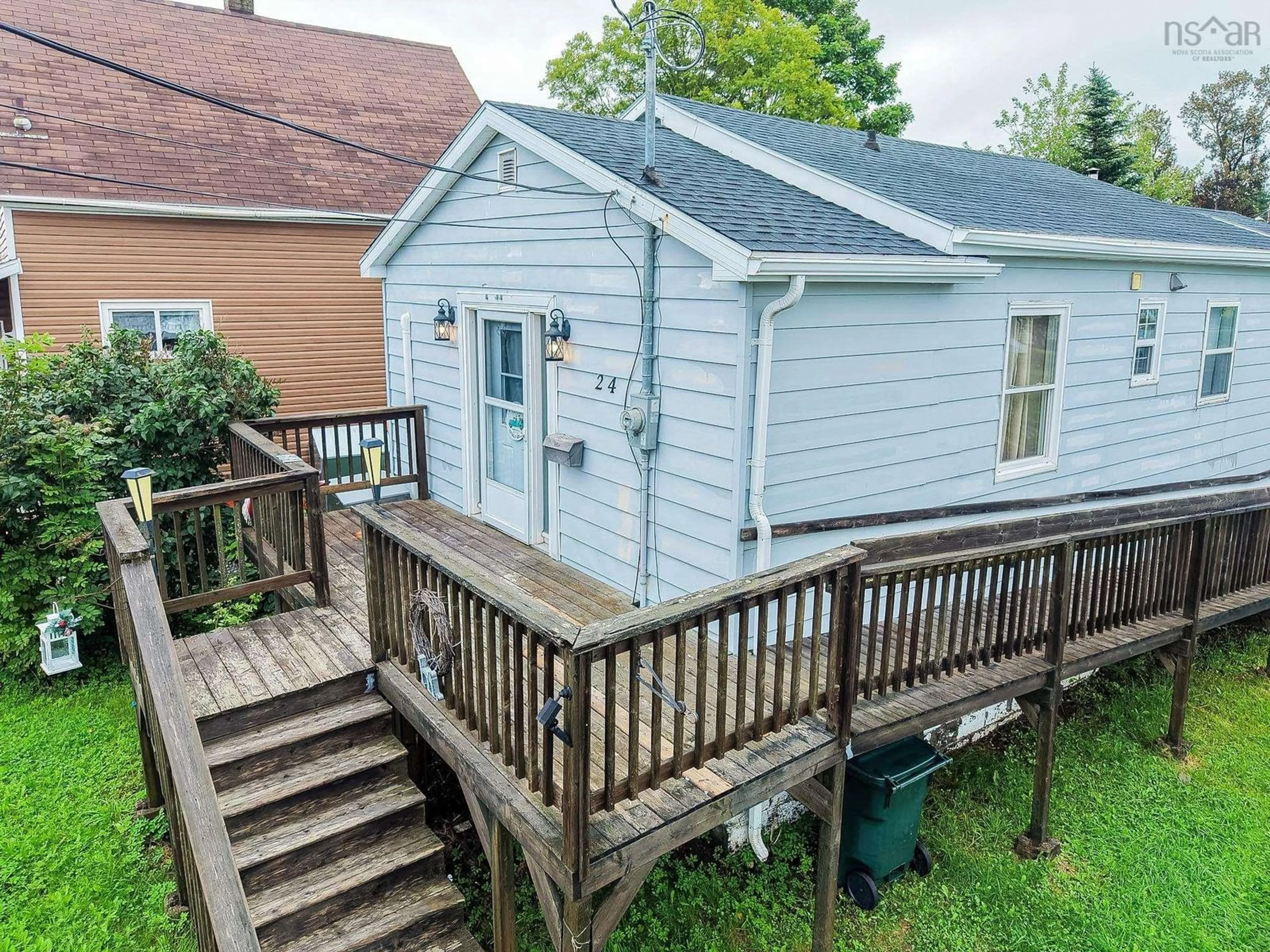 A pic from outside/outdoor area/front of a property/back of a property/a pic from drone, street for Beech St #24, Sydney Nova Scotia B1P 3B4