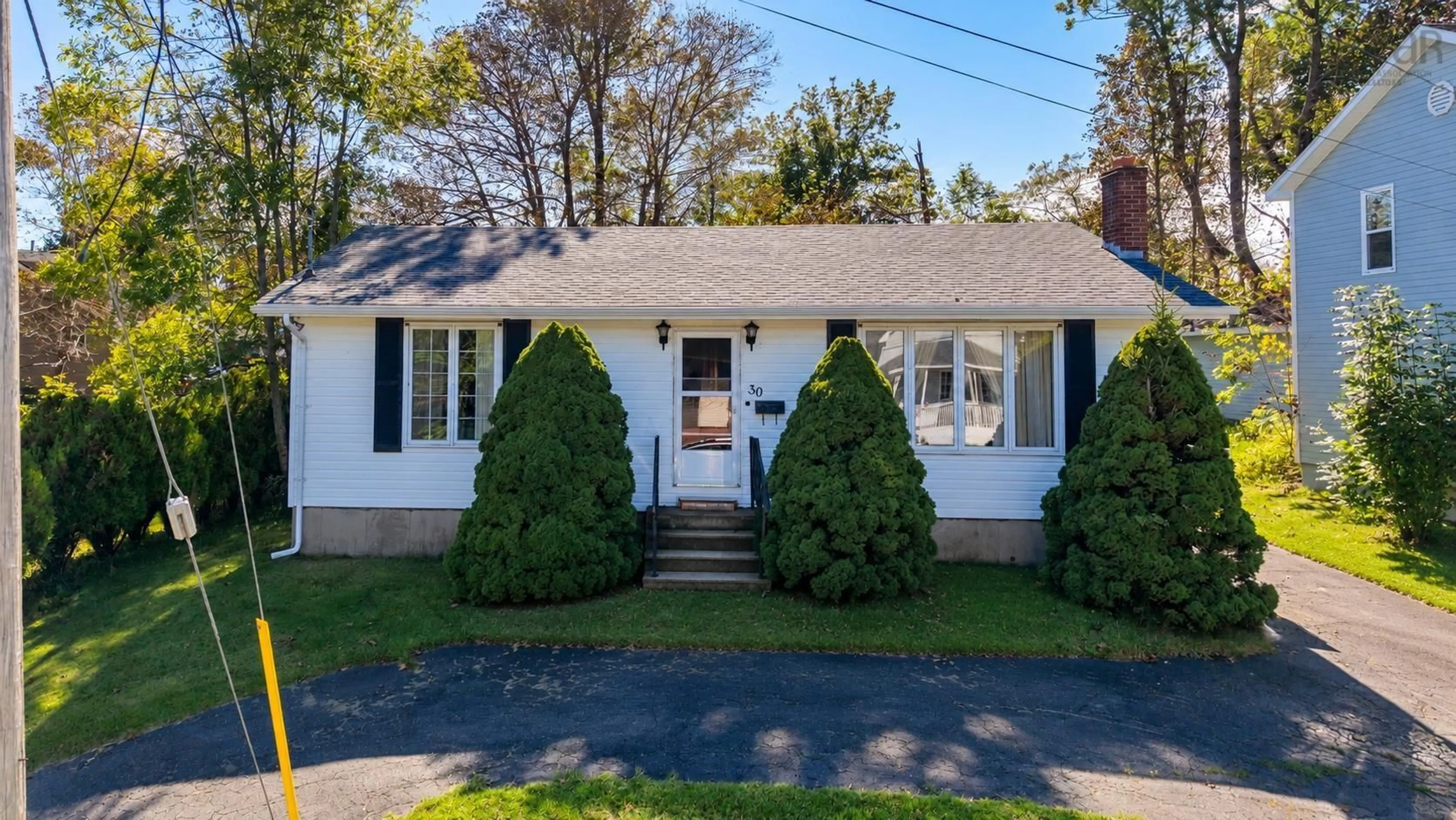 Home with vinyl exterior material, street for 30 Blowers St, North Sydney Nova Scotia B2A 2Y7