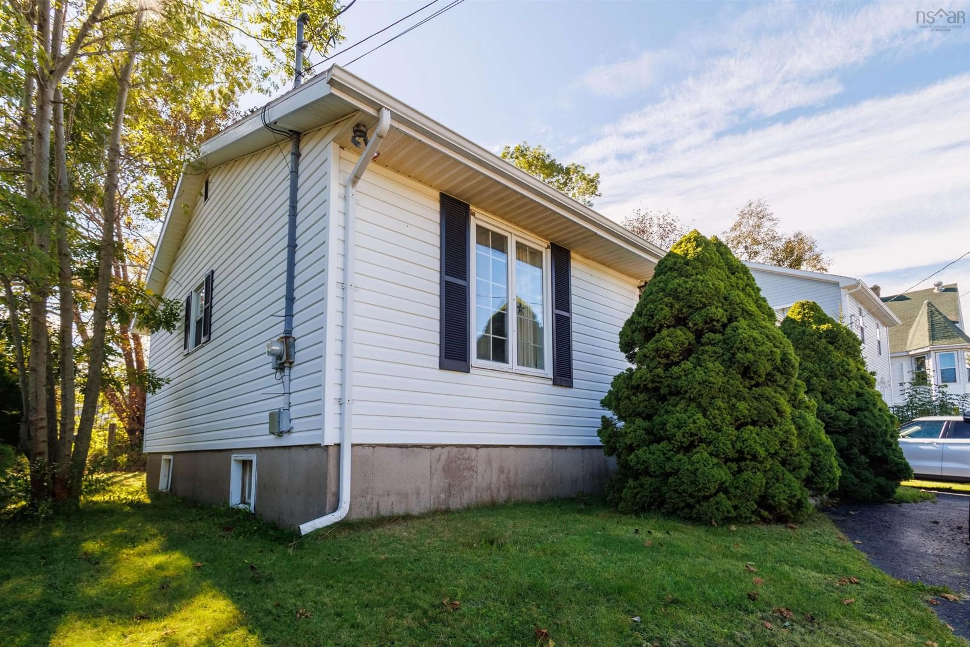 Home with vinyl exterior material, street for 30 Blowers St, North Sydney Nova Scotia B2A 2Y7