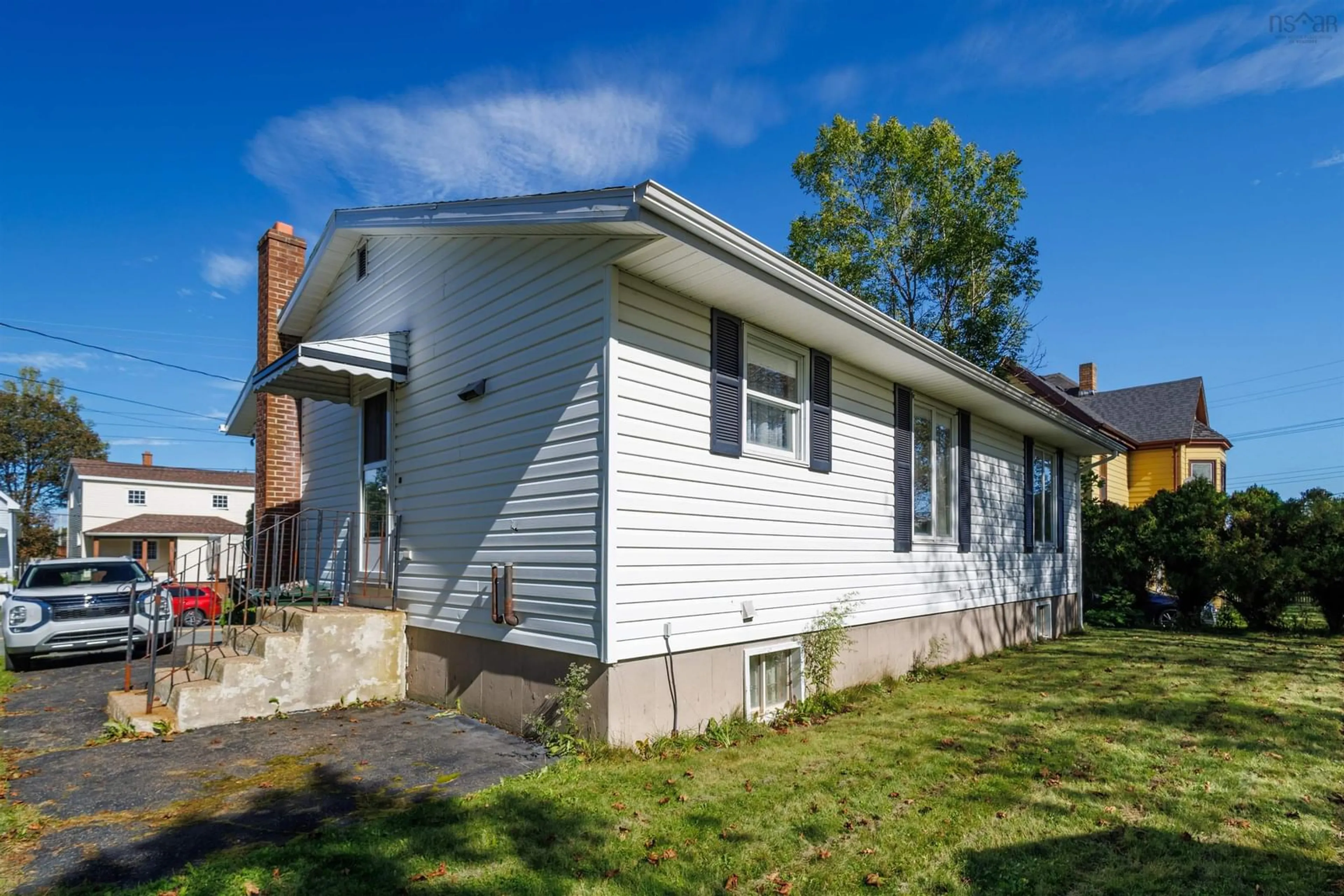 Home with vinyl exterior material, street for 30 Blowers St, North Sydney Nova Scotia B2A 2Y7