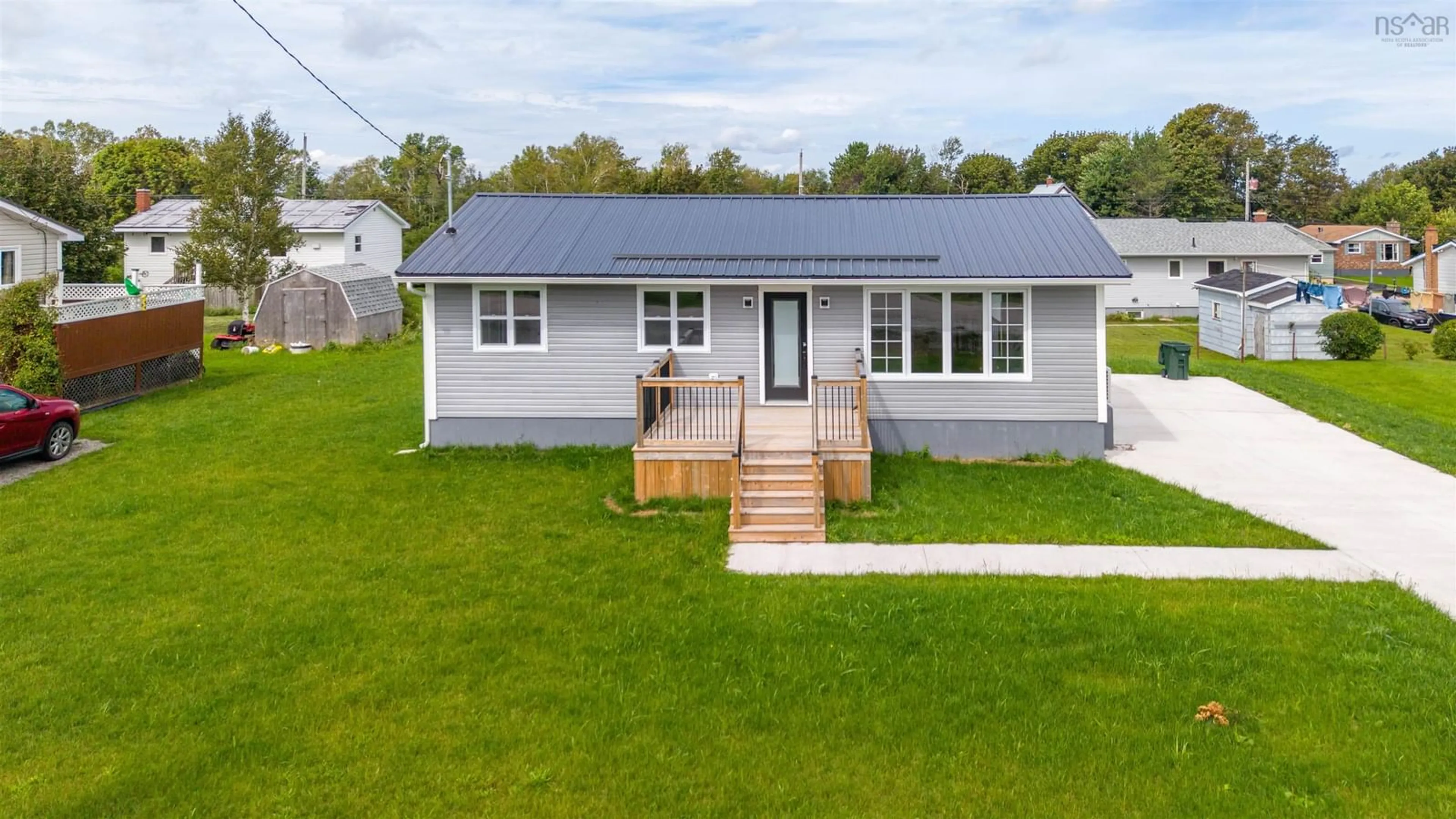A pic from outside/outdoor area/front of a property/back of a property/a pic from drone, unknown for 162 Monteith Ave, Westmount Nova Scotia B1J 1P4