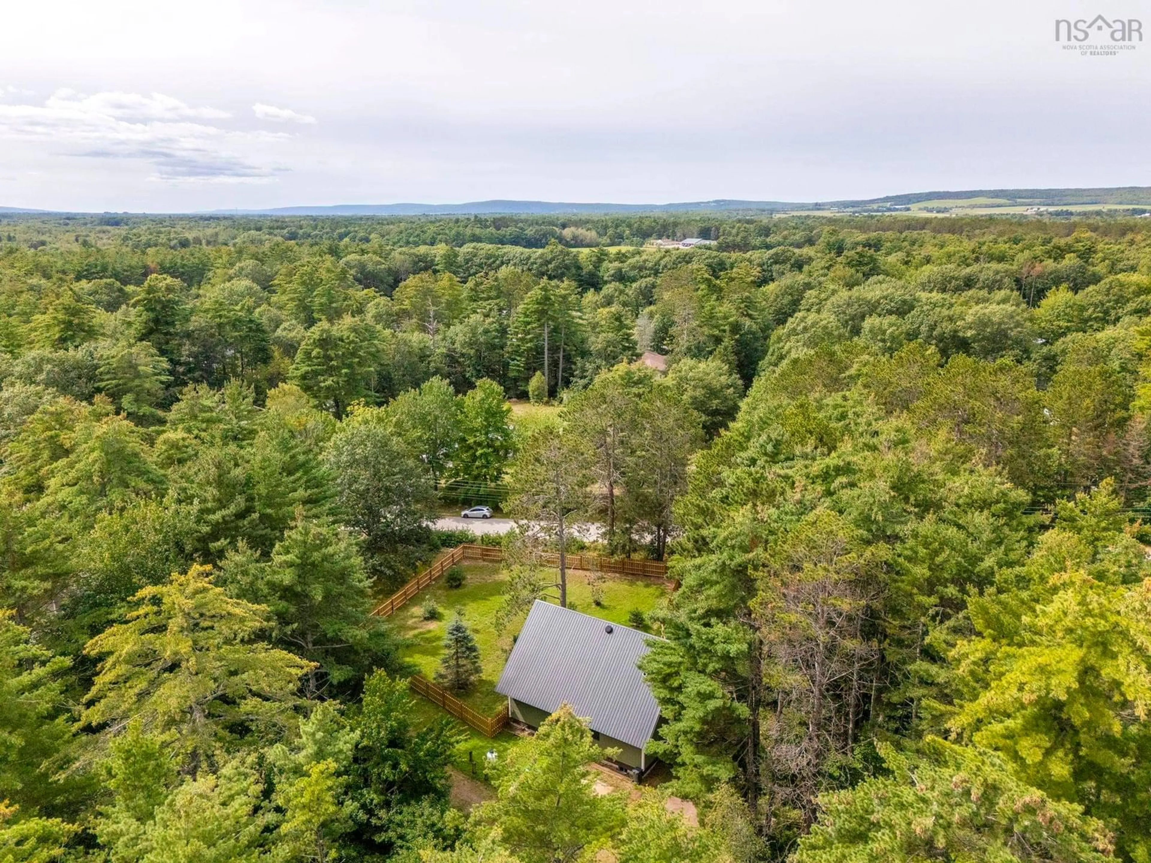 A pic from outside/outdoor area/front of a property/back of a property/a pic from drone, forest/trees view for 186 Brookside Dr, Wilmot Nova Scotia B0P 1R0