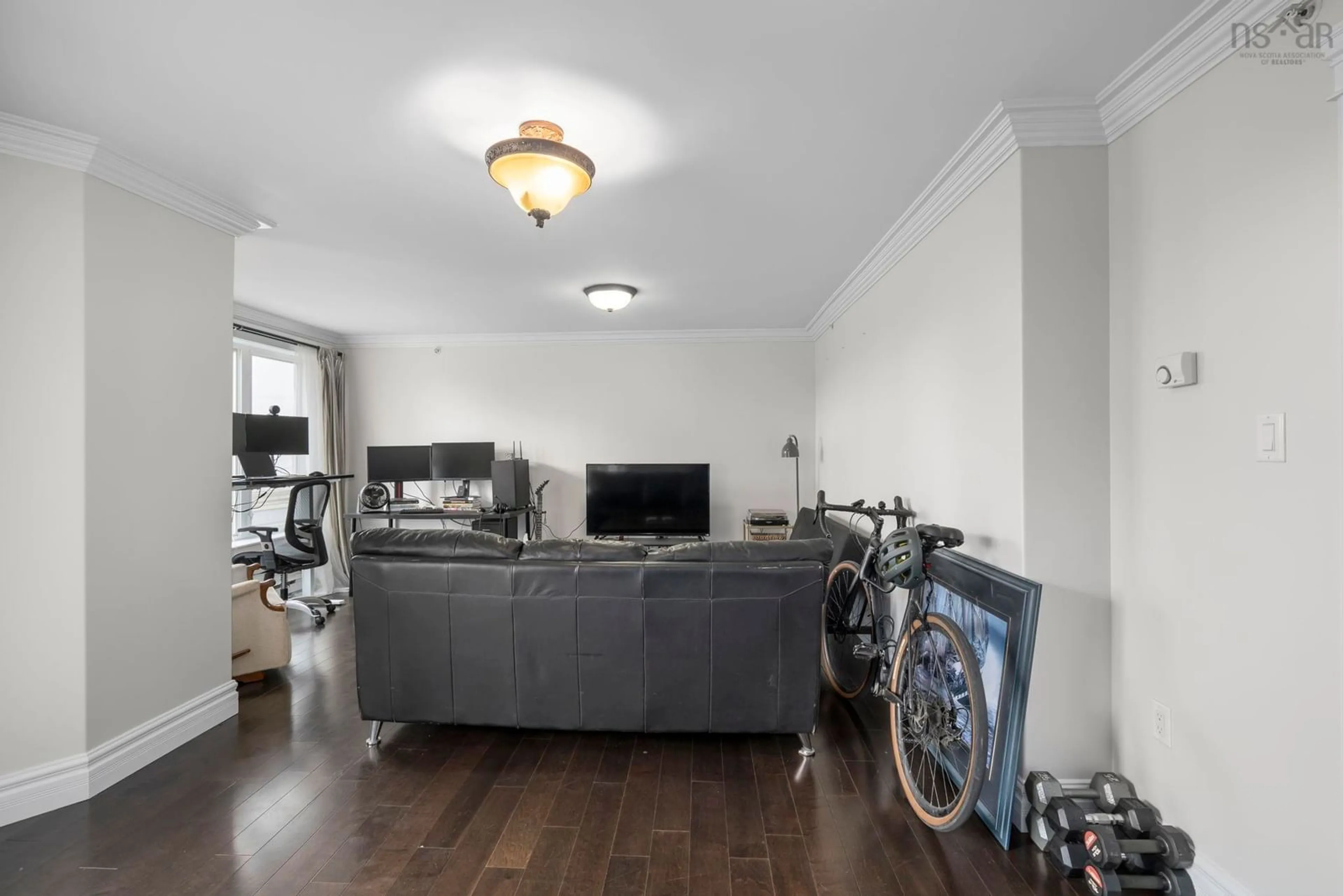 Living room with furniture, wood/laminate floor for 5689 Cunard St #301, Halifax Nova Scotia B3K 1C7
