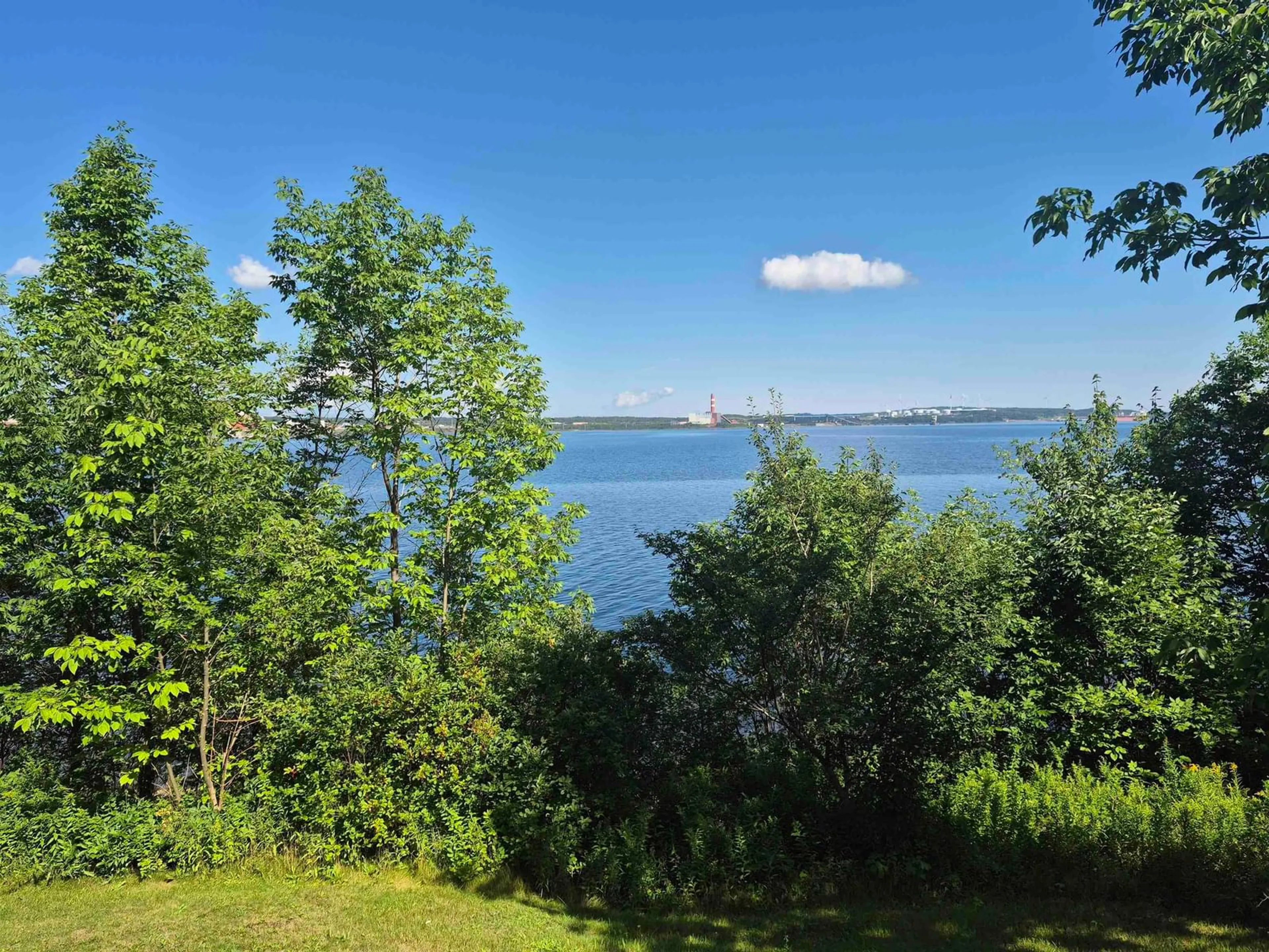 A pic from outside/outdoor area/front of a property/back of a property/a pic from drone, water/lake/river/ocean view for 650 Main St, Mulgrave Nova Scotia B0E 2G0