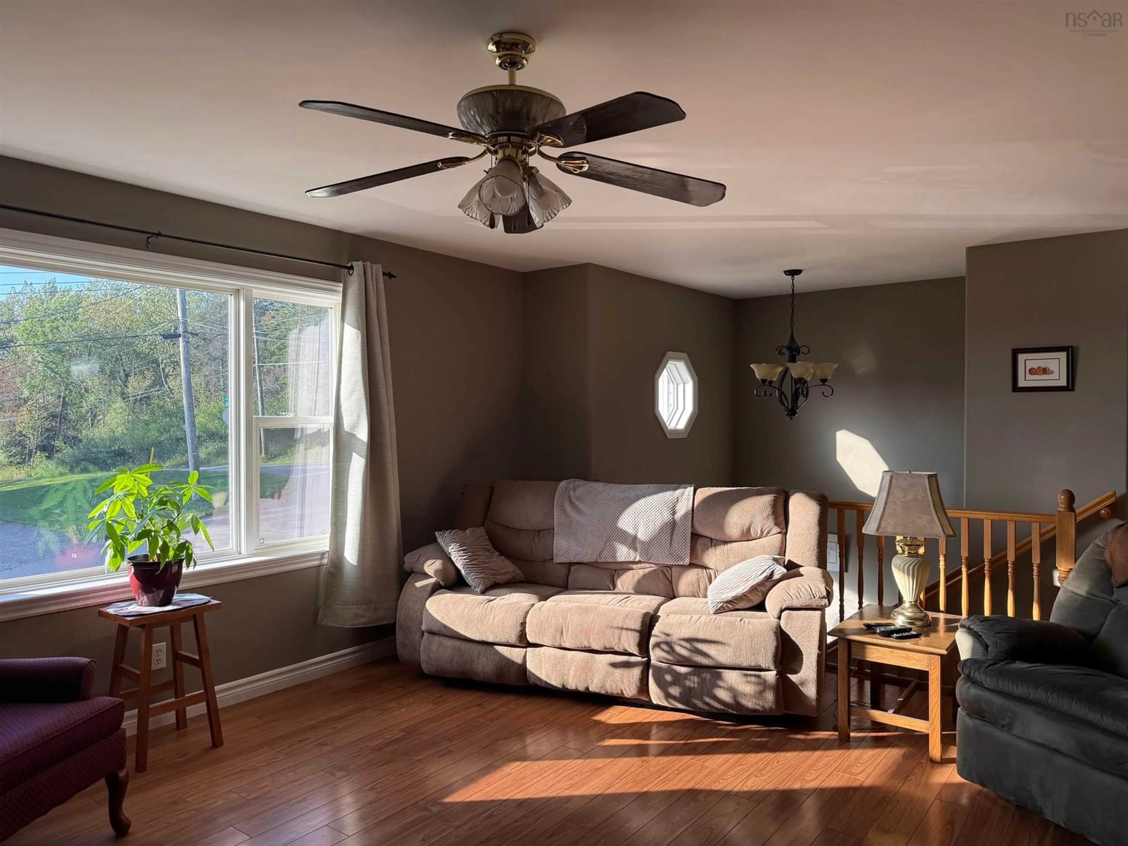 Living room with furniture, wood/laminate floor for 96 Green St, New Glasgow Nova Scotia B2H 4A1
