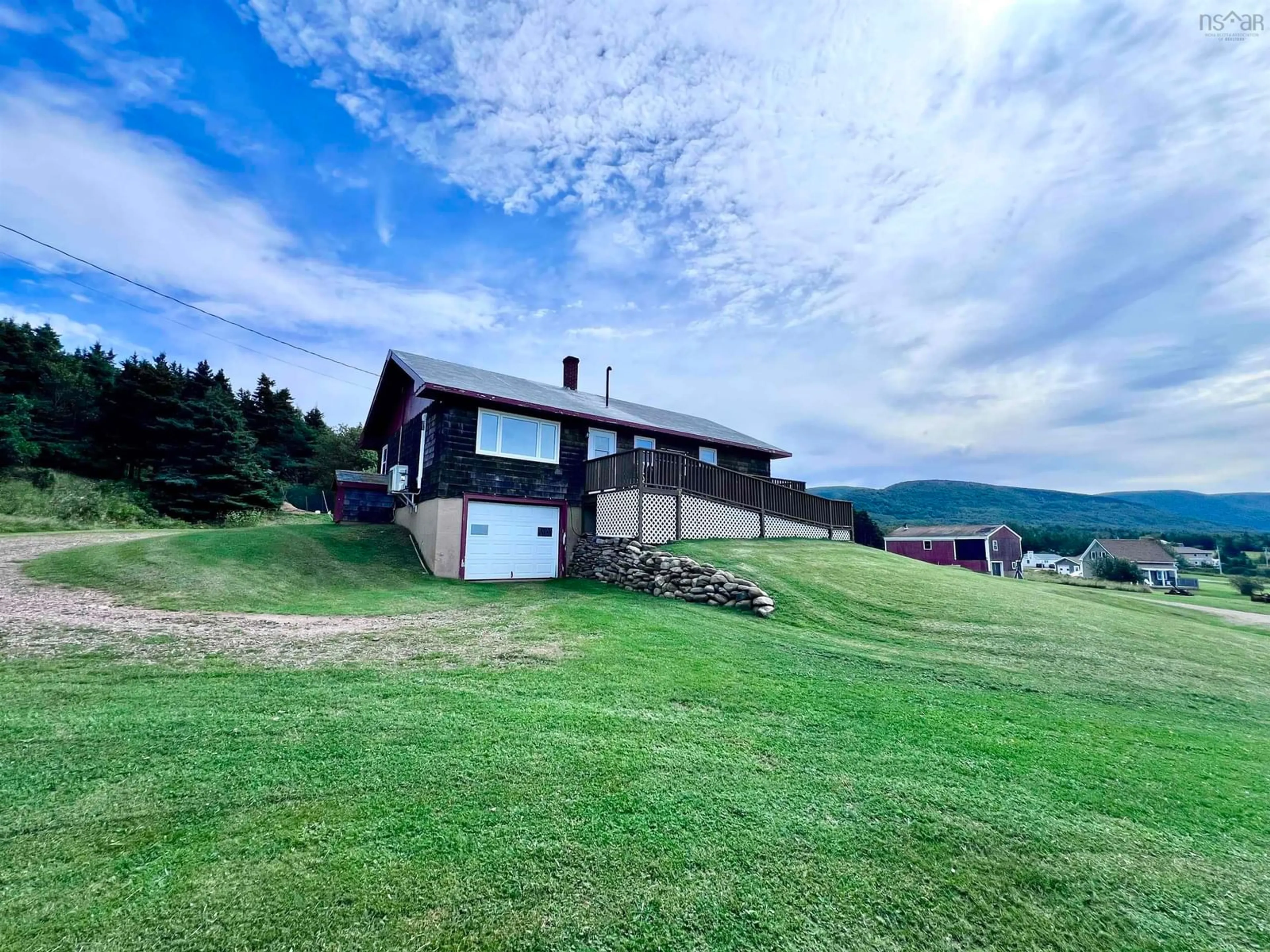 A pic from outside/outdoor area/front of a property/back of a property/a pic from drone, mountain view for 14086 Cabot Trail, Chéticamp Nova Scotia B0E 1H0