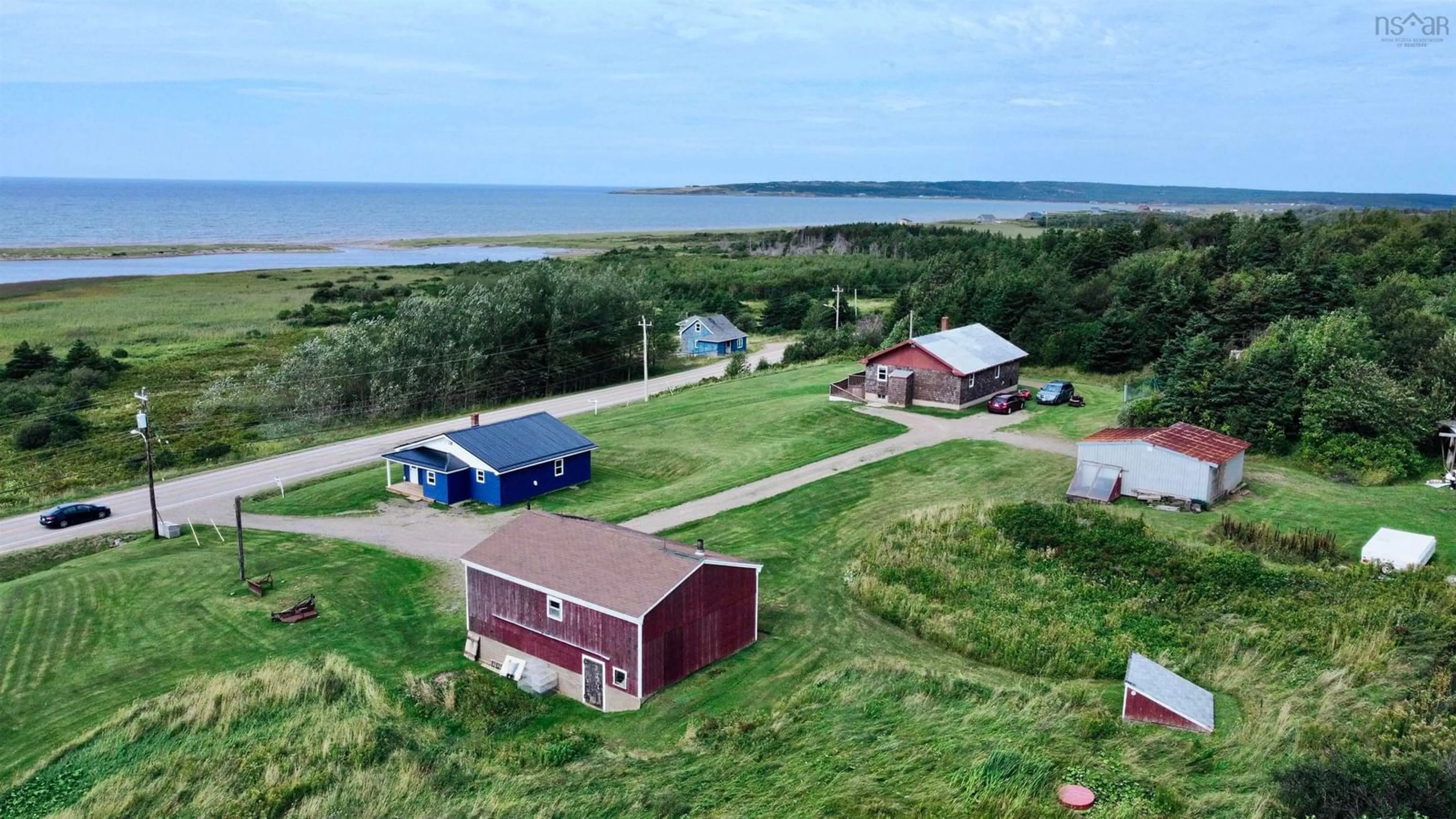 A pic from outside/outdoor area/front of a property/back of a property/a pic from drone, water/lake/river/ocean view for 14086 Cabot Trail, Chéticamp Nova Scotia B0E 1H0