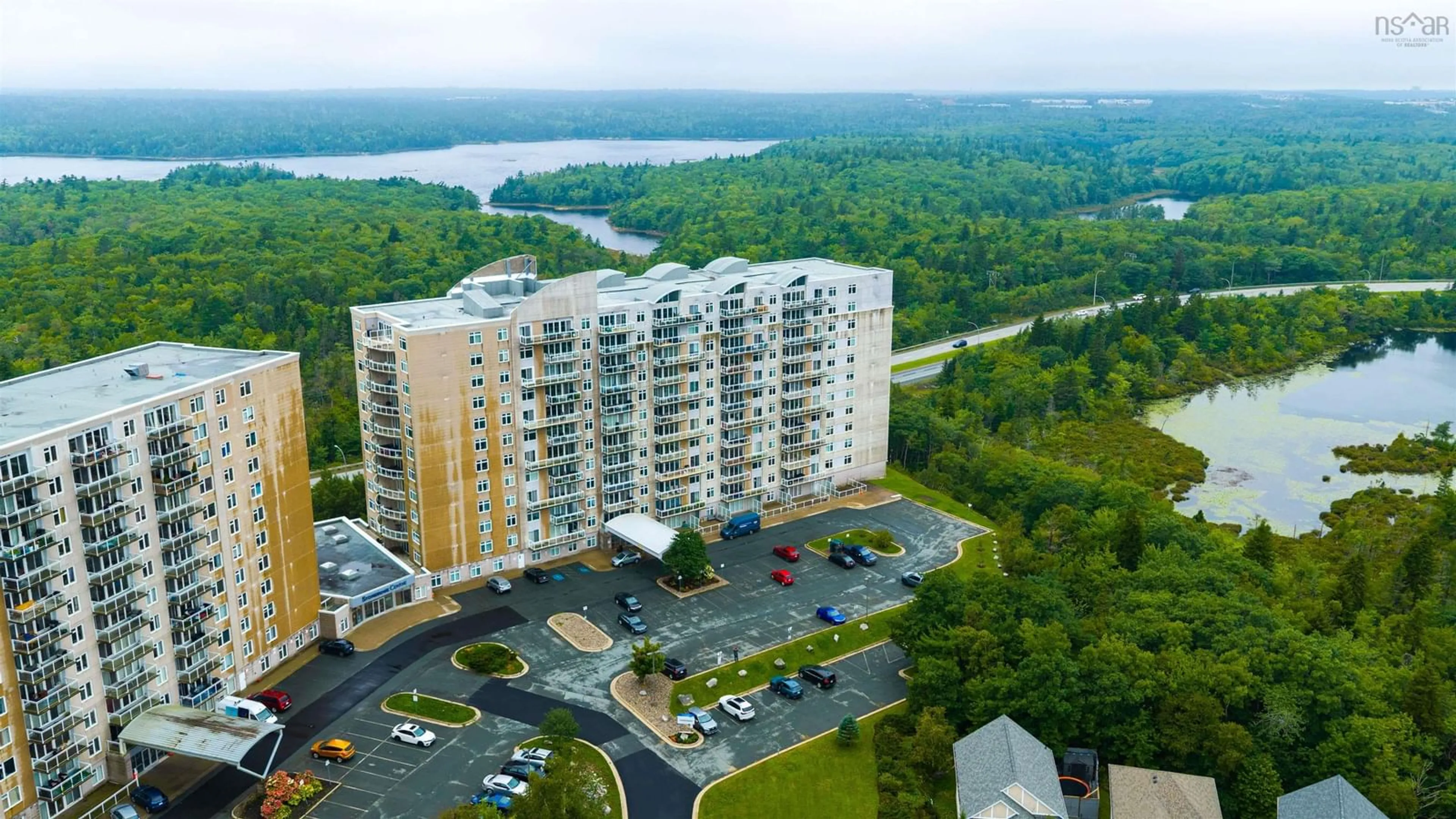 A pic from outside/outdoor area/front of a property/back of a property/a pic from drone, water/lake/river/ocean view for 60 Walter Havill Dr #303, Halifax Nova Scotia B3N 0A9