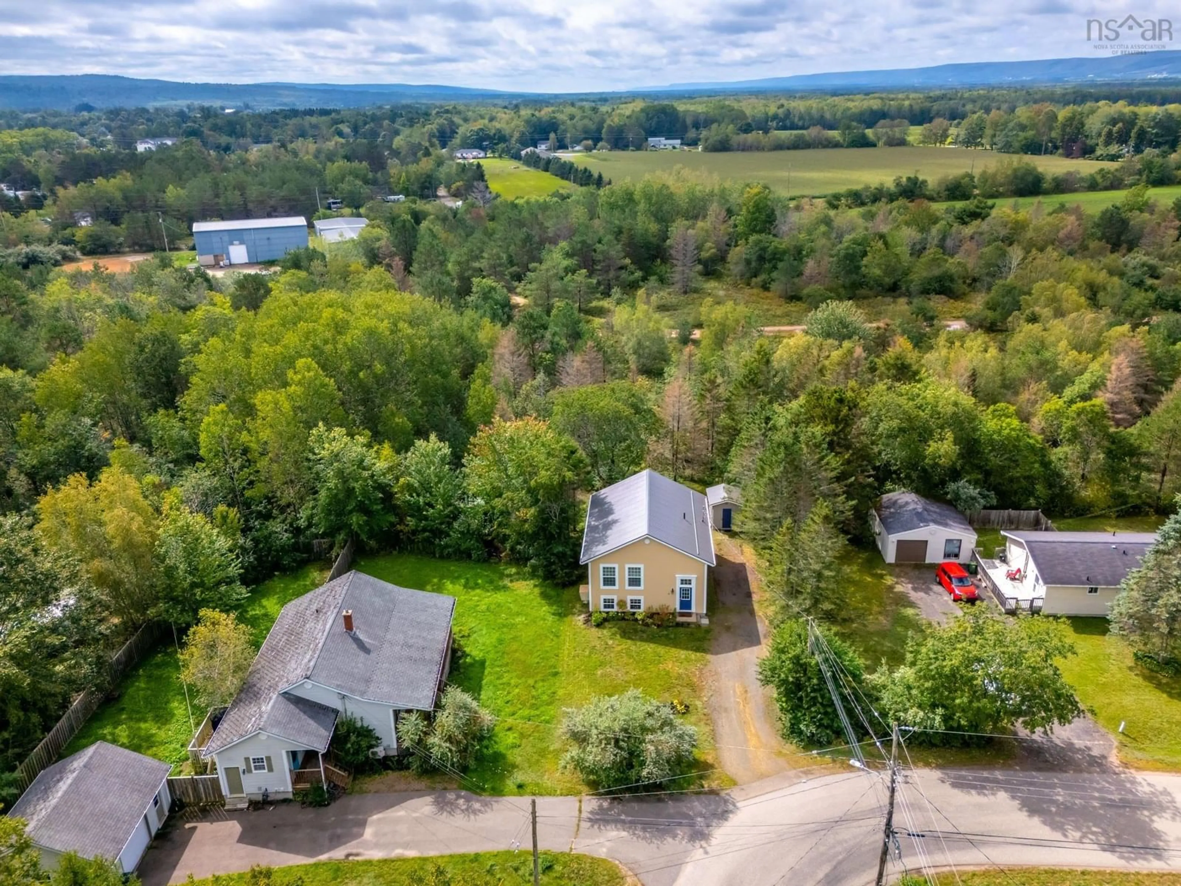 A pic from outside/outdoor area/front of a property/back of a property/a pic from drone, mountain view for 1 Old Runway Dr, Nictaux Nova Scotia B0S 1P0